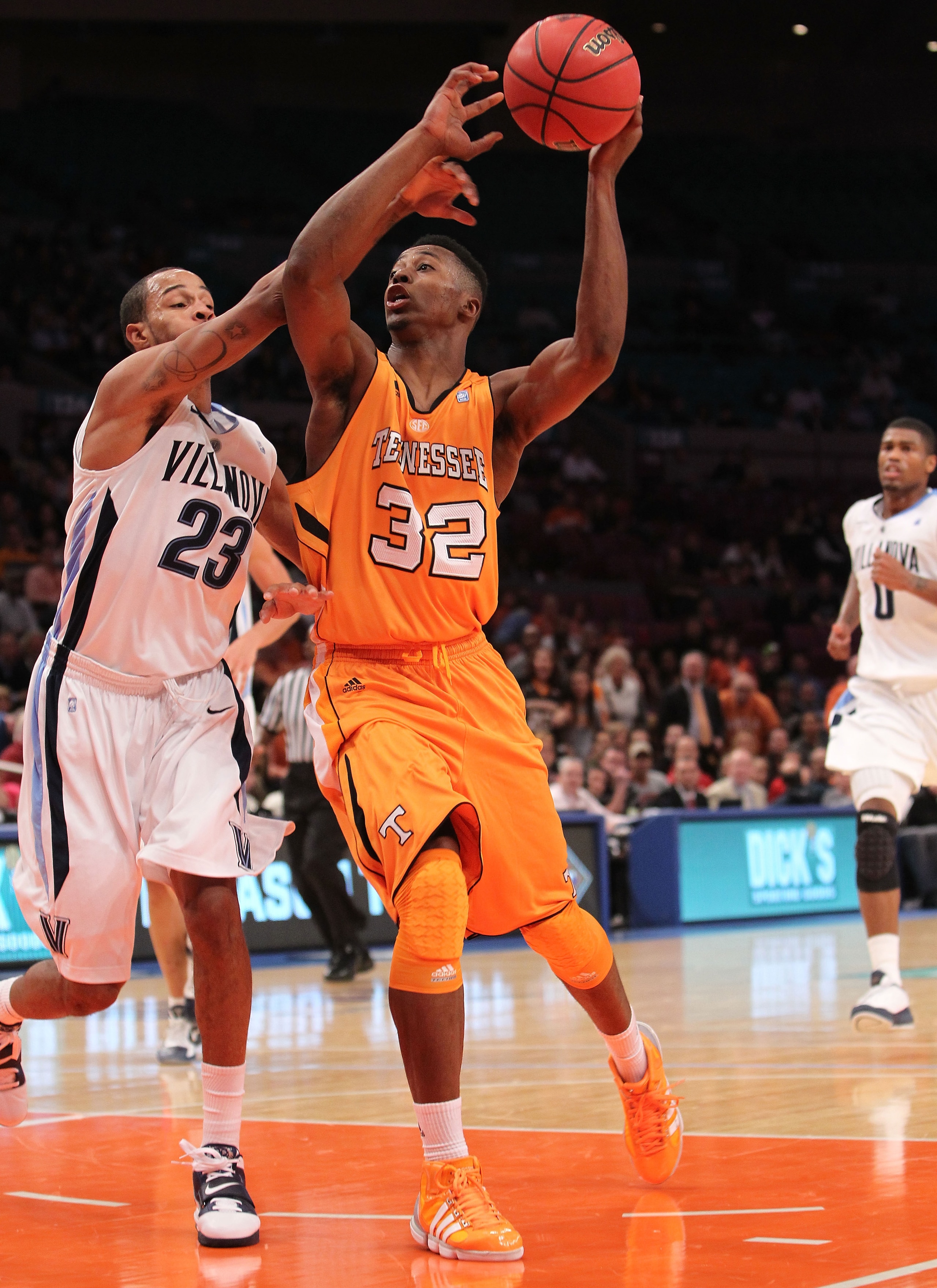 NEW YORK - NOVEMBER 26: Scotty Hopson #32 of the Tennessee Volunteers is fouled by Dominic Cheek #23 of the Villanova Wildcats during the Championship game at Madison Square Garden on November 26, 2010 in New York City. (Photo by Nick Laham/Getty Image NEW YORK - NOVEMBER 26: Scotty Hopson #32 of the Tennessee Volunteers is fouled by Dominic Cheek #23 of the Villanova Wildcats during the Championship game at Madison Square Garden on November 26, 2010 in New York City. (Photo by Nick Laham/Getty Image