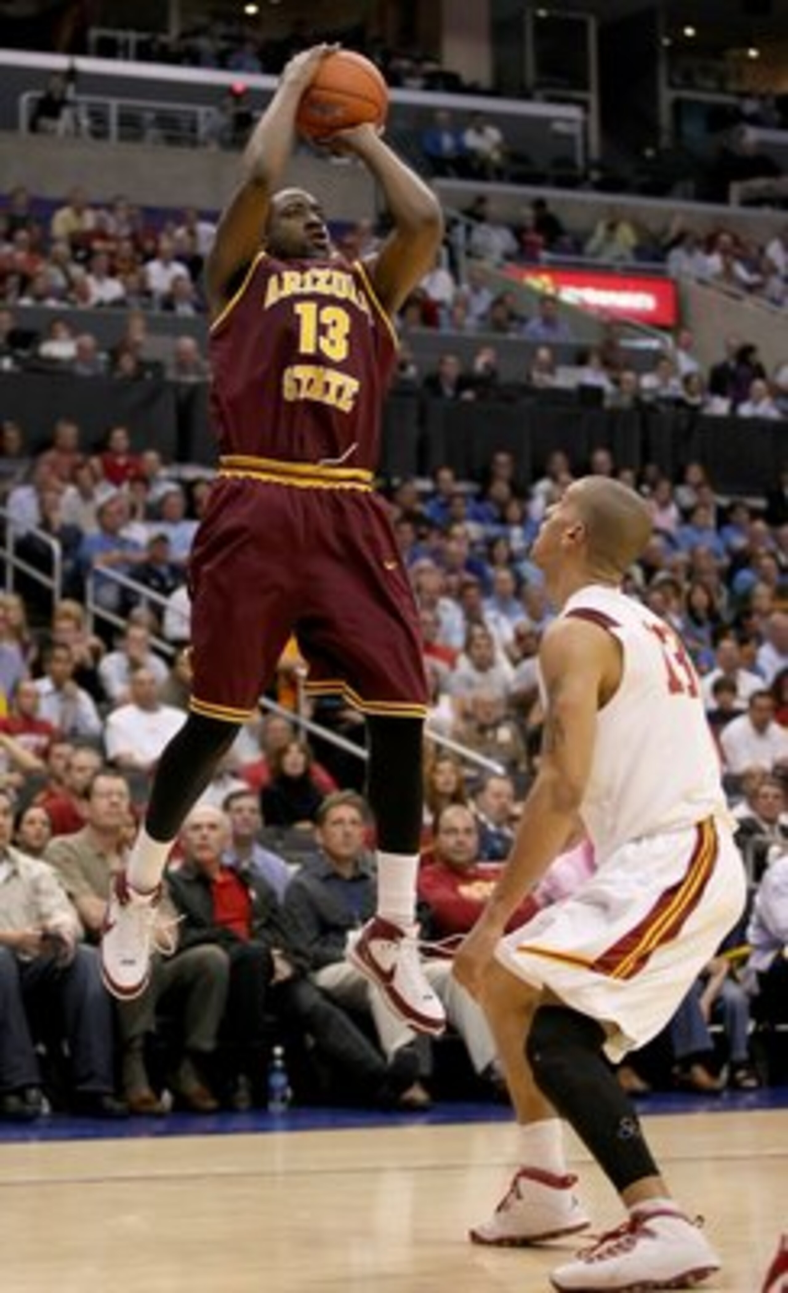 LOS ANGELES, CA - MARCH 13: James Harden #13 of the Arizona State Sun Devils shoots over the defense of Daniel Hackett #13 of the USC Trojans during the 2008 Pacific Life Pac-10 Men's Basketball Tournament Day Two at Staples Center on March 13, 2008 in L LOS ANGELES, CA - MARCH 13: James Harden #13 of the Arizona State Sun Devils shoots over the defense of Daniel Hackett #13 of the USC Trojans during the 2008 Pacific Life Pac-10 Men's Basketball Tournament Day Two at Staples Center on March 13, 2008 in L
