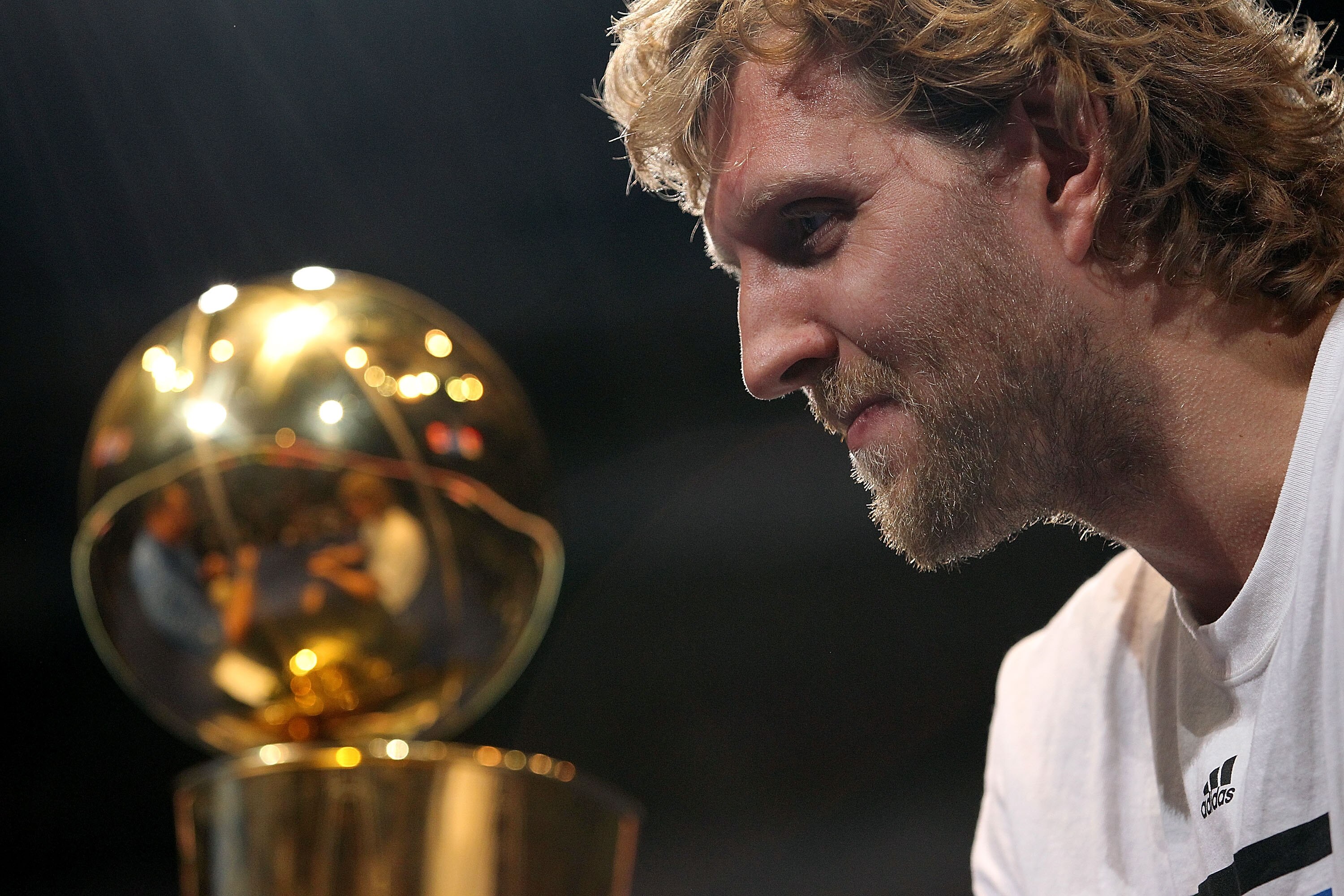 DALLAS, TX - JUNE 16:  Dirk Nowitzki of the Dallas Mavericks gets emotional after the Dallas Mavericks Victory Parade at American Airlines Center on June 16, 2011 in Dallas, Texas.  (Photo by Ronald Martinez/Getty Images)