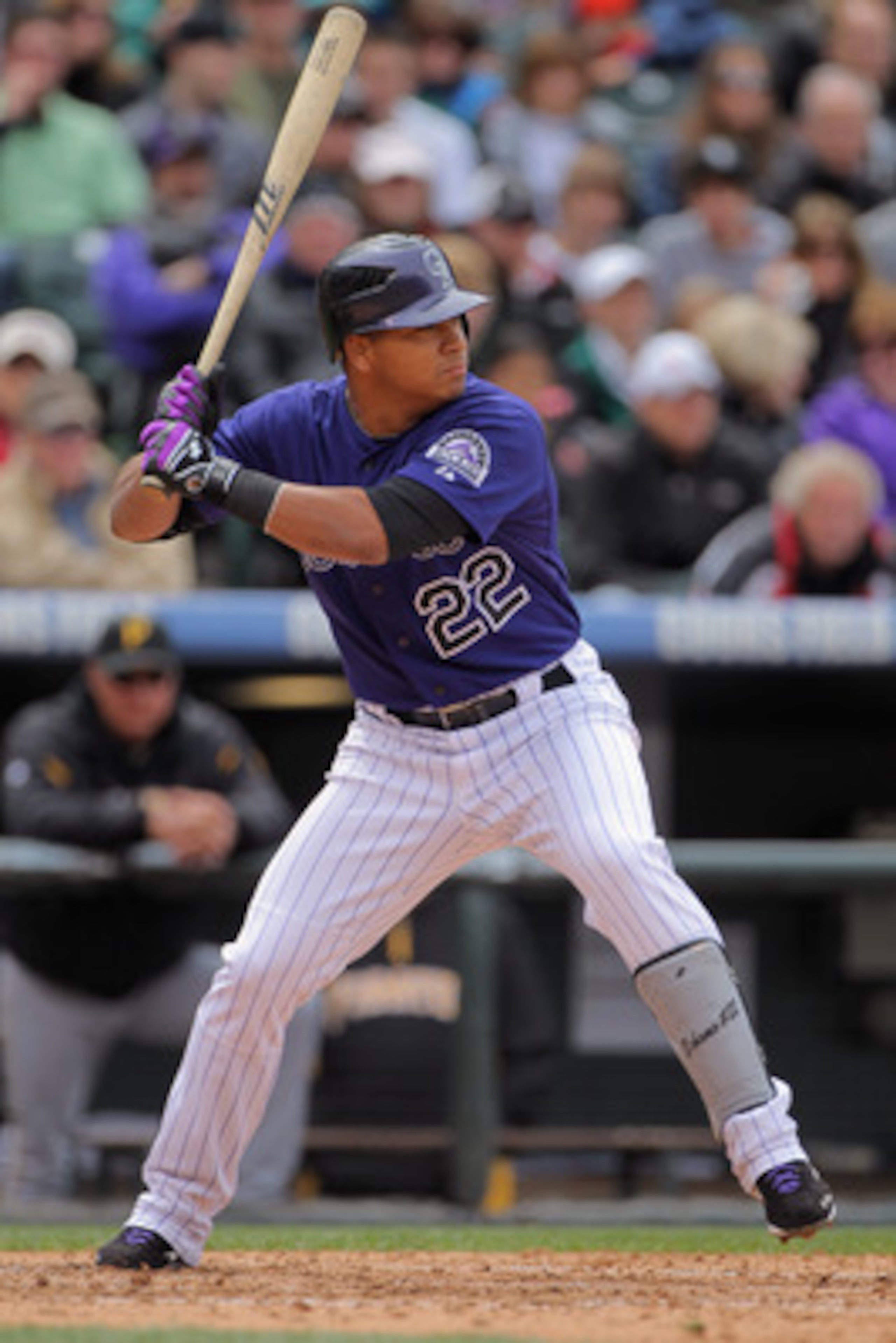 DENVER, CO - MAY 01:  Third baseman Jose Lopez #22 of the Colorado Rockies takes an at bat against the Pittsburgh Pirates at Coors Field on May 1, 2011 in Denver, Colorado. The Pirates defeated the Rockies 8-4.  (Photo by Doug Pensinger/Getty Images)