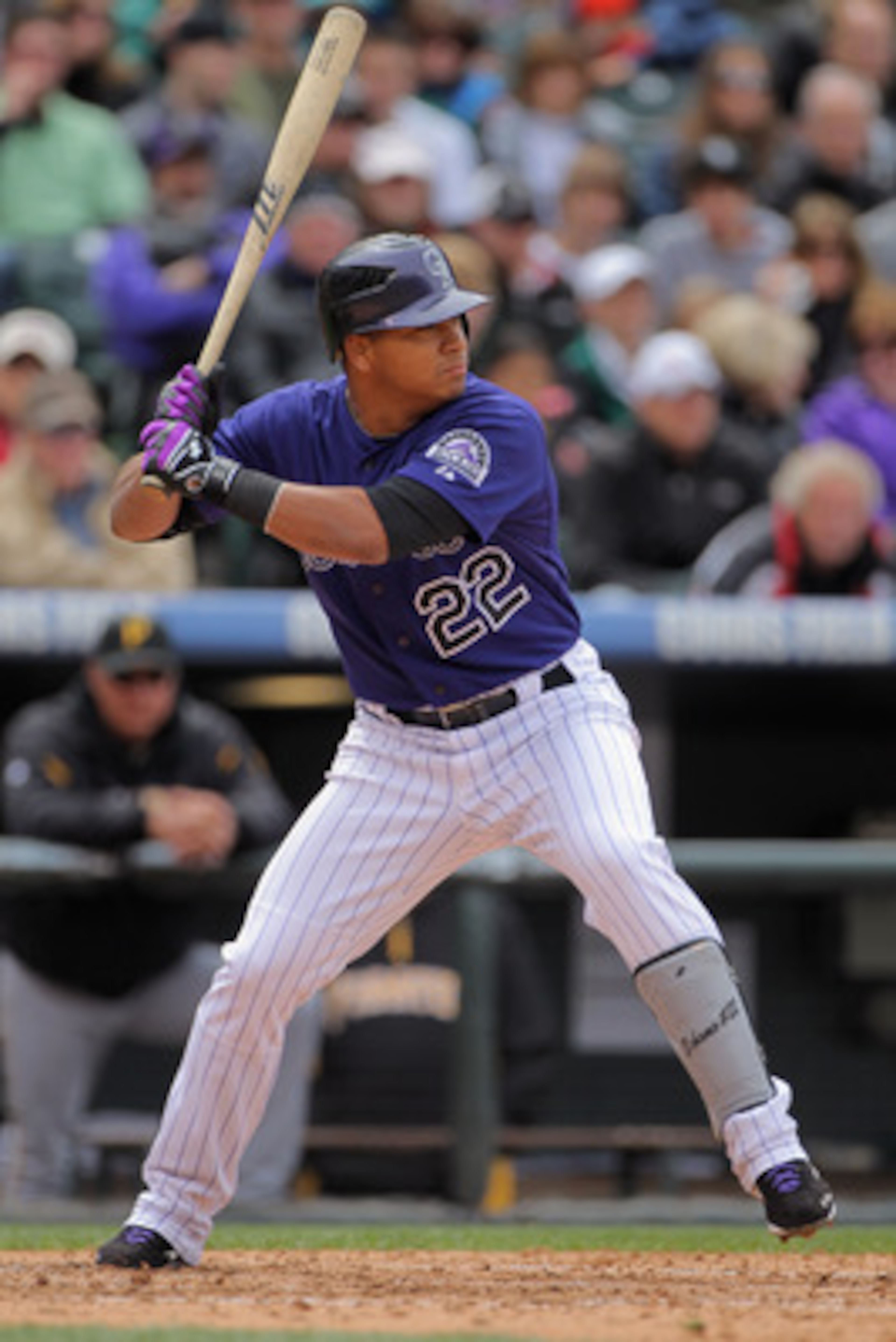 DENVER, CO - MAY 01:  Third baseman Jose Lopez #22 of the Colorado Rockies takes an at bat against the Pittsburgh Pirates at Coors Field on May 1, 2011 in Denver, Colorado. The Pirates defeated the Rockies 8-4.  (Photo by Doug Pensinger/Getty Images)