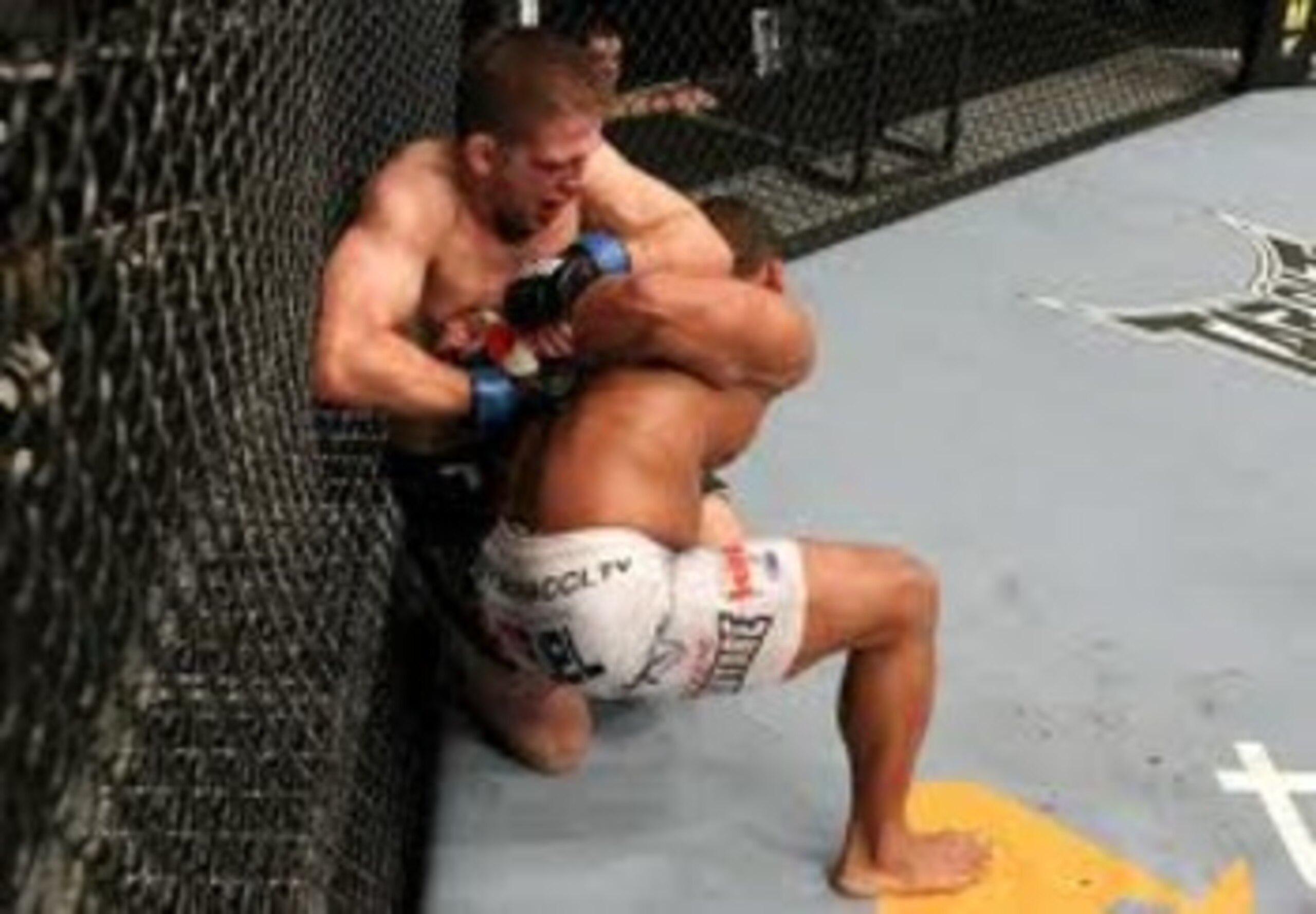 Nik Lentz attempting to lock in a kimura on Tyson Griffin