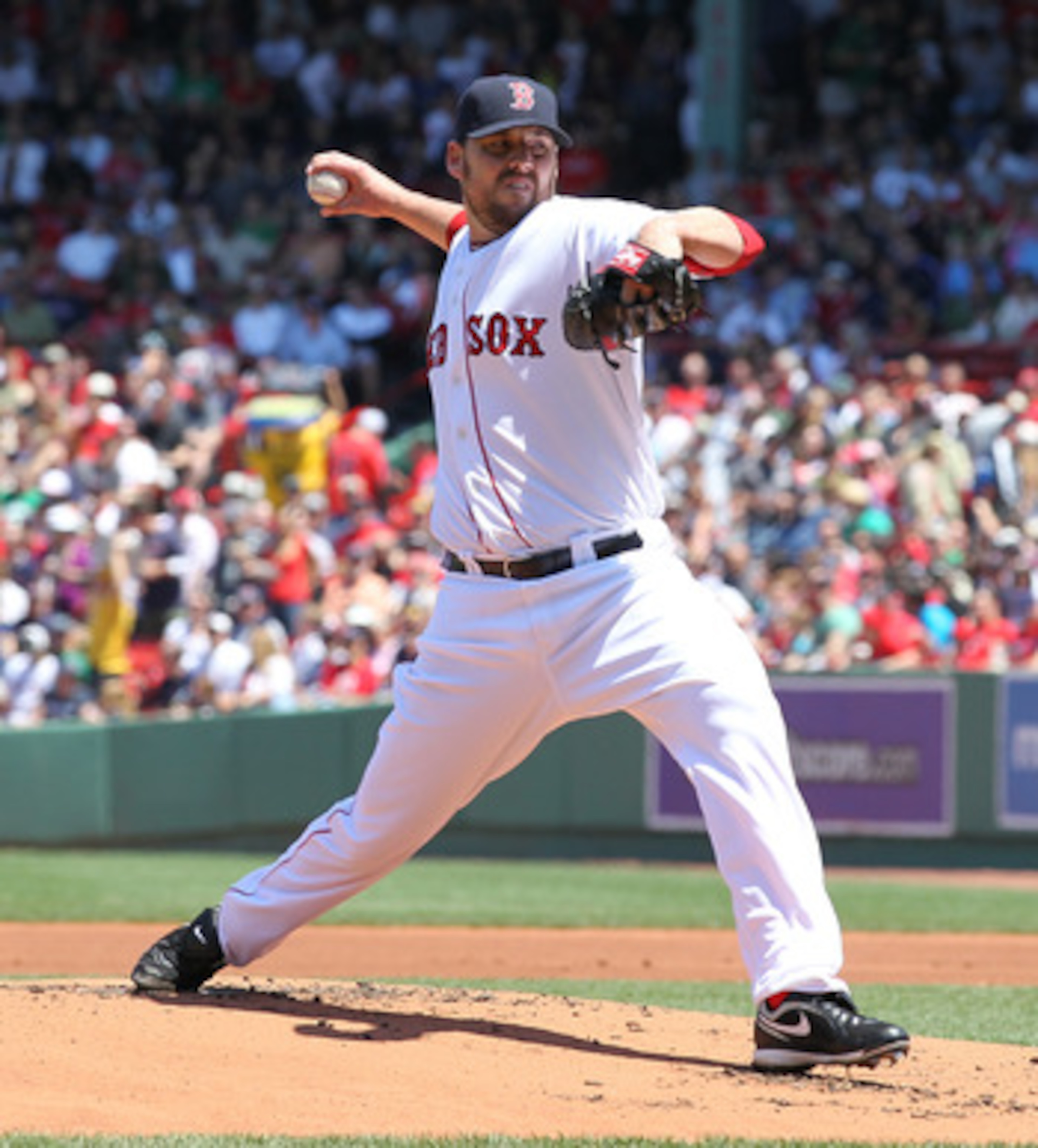 BOSTON, MA - JUNE 5:  John Lackey #41 of the Boston Red Sox throws against the Oakland Athletics at Fenway Park on June 5, 2011 in Boston, Massachusetts.  (Photo by Jim Rogash/Getty Images)