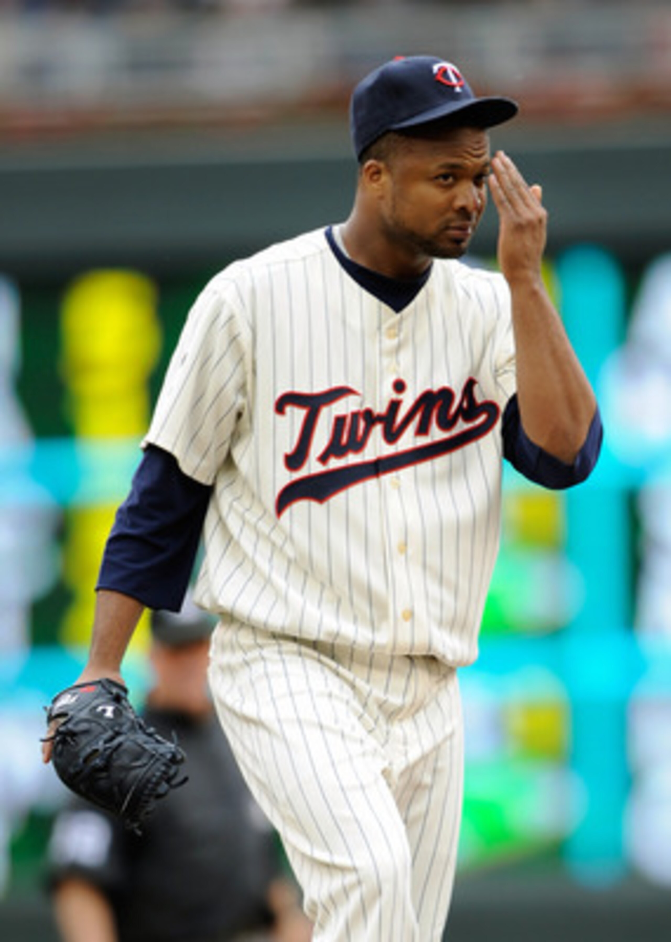 MINNEAPOLIS, MN - JUNE 12: Francisco Liriano #47 of the Minnesota Twins reacts to giving up a hit to Adrian Beltre #29 of the Texas Rangers during the eighth inning of their game on June 12, 2011 at Target Field in Minneapolis, Minnesota. Twins defeated t