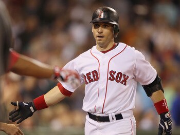BOSTON - SEPTEMBER 08: Marco Scutaro #16 of the Boston Red Sox is congratulated after he hit a two run homer against the Tampa Bay Rays on September 8, 2010 at Fenway Park in Boston, Massachusetts. (Photo by Elsa/Getty Images) BOSTON - SEPTEMBER 08: Marco Scutaro #16 of the Boston Red Sox is congratulated after he hit a two run homer against the Tampa Bay Rays on September 8, 2010 at Fenway Park in Boston, Massachusetts. (Photo by Elsa/Getty Images)