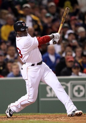 BOSTON, MA - MAY 22: Mike Cameron #23 of the Boston Red Sox hits an RBI single in the fourth inning against the Chicago Cubs on May 22, 2011 at Fenway Park in Boston, Massachusetts. Before this series, the two teams haven't played at Fenway Park since t BOSTON, MA - MAY 22: Mike Cameron #23 of the Boston Red Sox hits an RBI single in the fourth inning against the Chicago Cubs on May 22, 2011 at Fenway Park in Boston, Massachusetts. Before this series, the two teams haven't played at Fenway Park since t