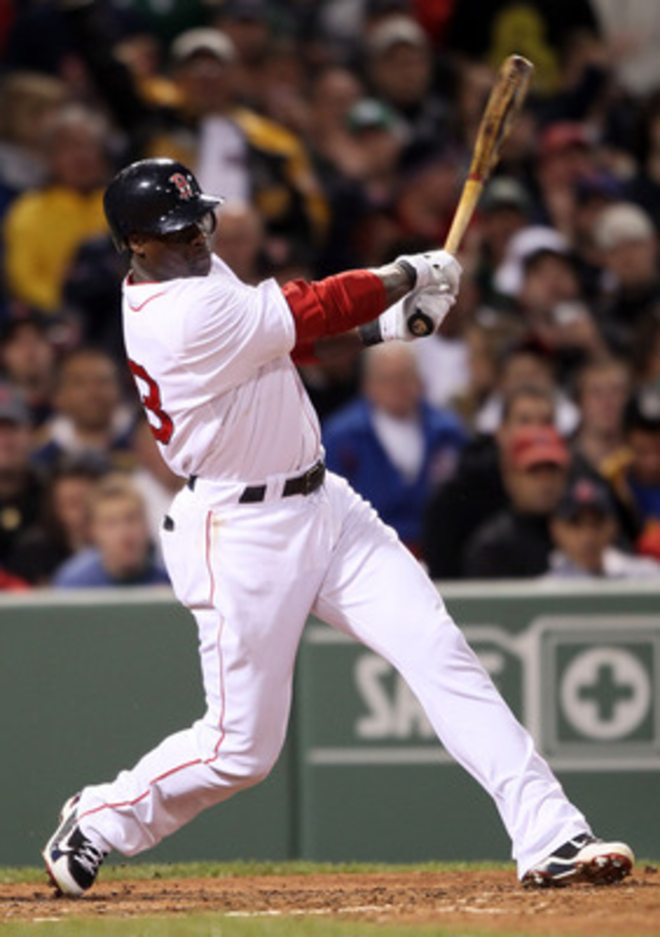 BOSTON, MA - MAY 22: Mike Cameron #23 of the Boston Red Sox hits an RBI single in the fourth inning against the Chicago Cubs on May 22, 2011 at Fenway Park in Boston, Massachusetts. Before this series, the two teams haven't played at Fenway Park since t BOSTON, MA - MAY 22: Mike Cameron #23 of the Boston Red Sox hits an RBI single in the fourth inning against the Chicago Cubs on May 22, 2011 at Fenway Park in Boston, Massachusetts. Before this series, the two teams haven't played at Fenway Park since t