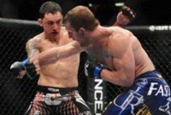 Maynard had Edgar hurt badly early, but the champ recovered and came back