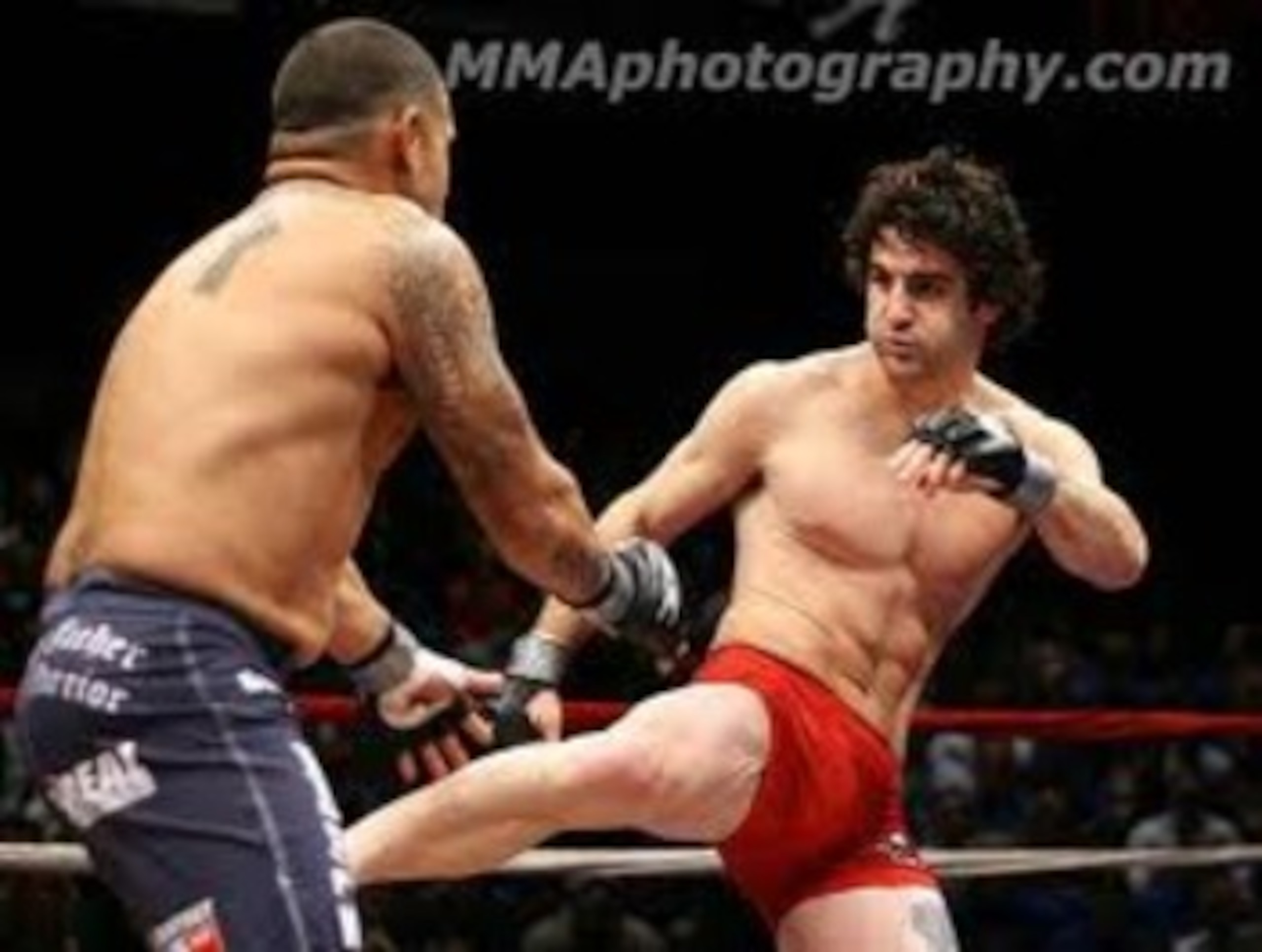 Charlie Brenneman landing a solid leg kick