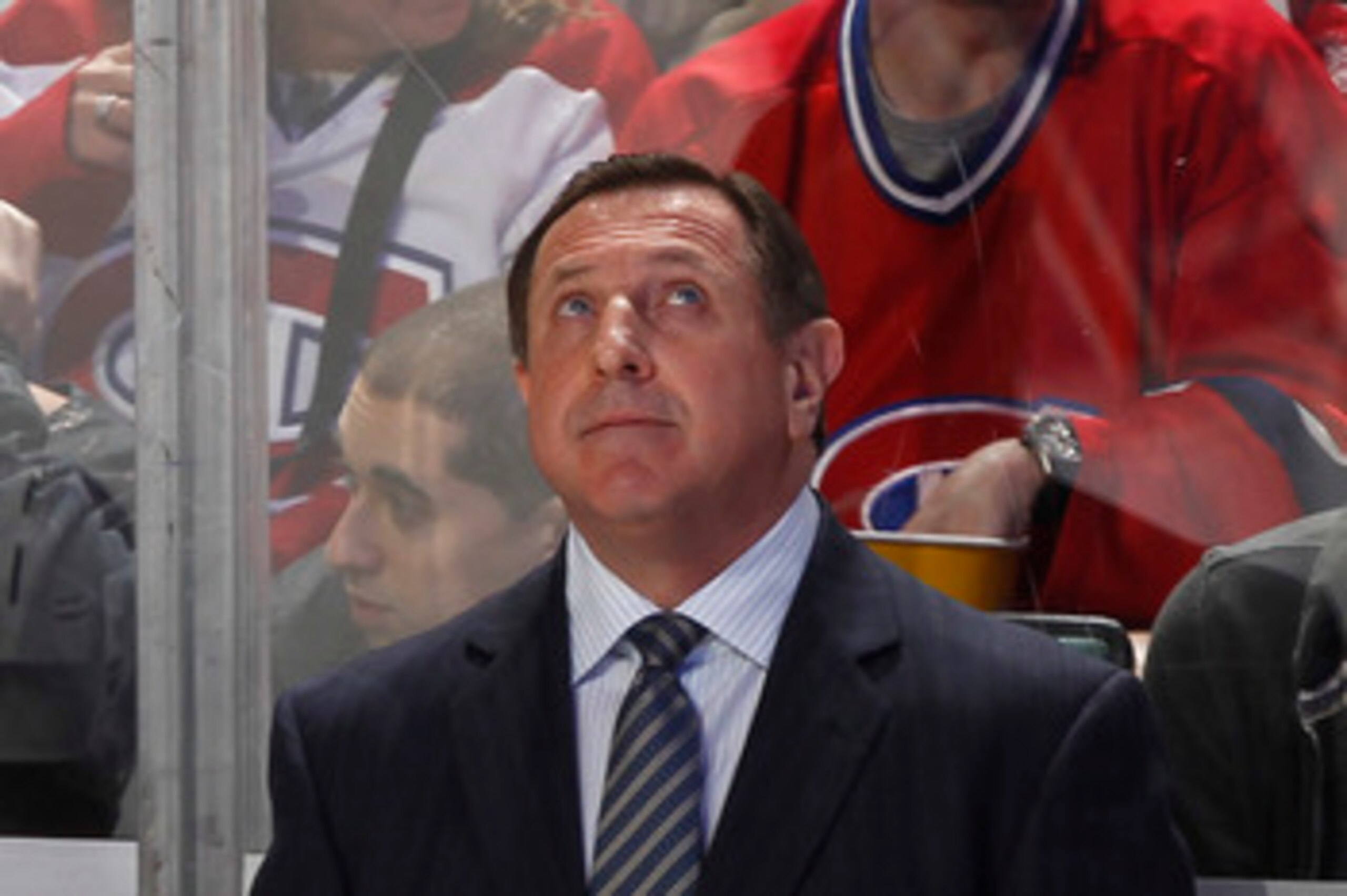 SUNRISE, FL - MARCH 3: Head coach Jacques Martin of the Montreal Canadiens watches a replay during a break in action against the Florida Panthers on March 3, 2011 at the BankAtlantic Center in Sunrise, Florida. The Canadiens defeated the Panthers 4-0. (Ph