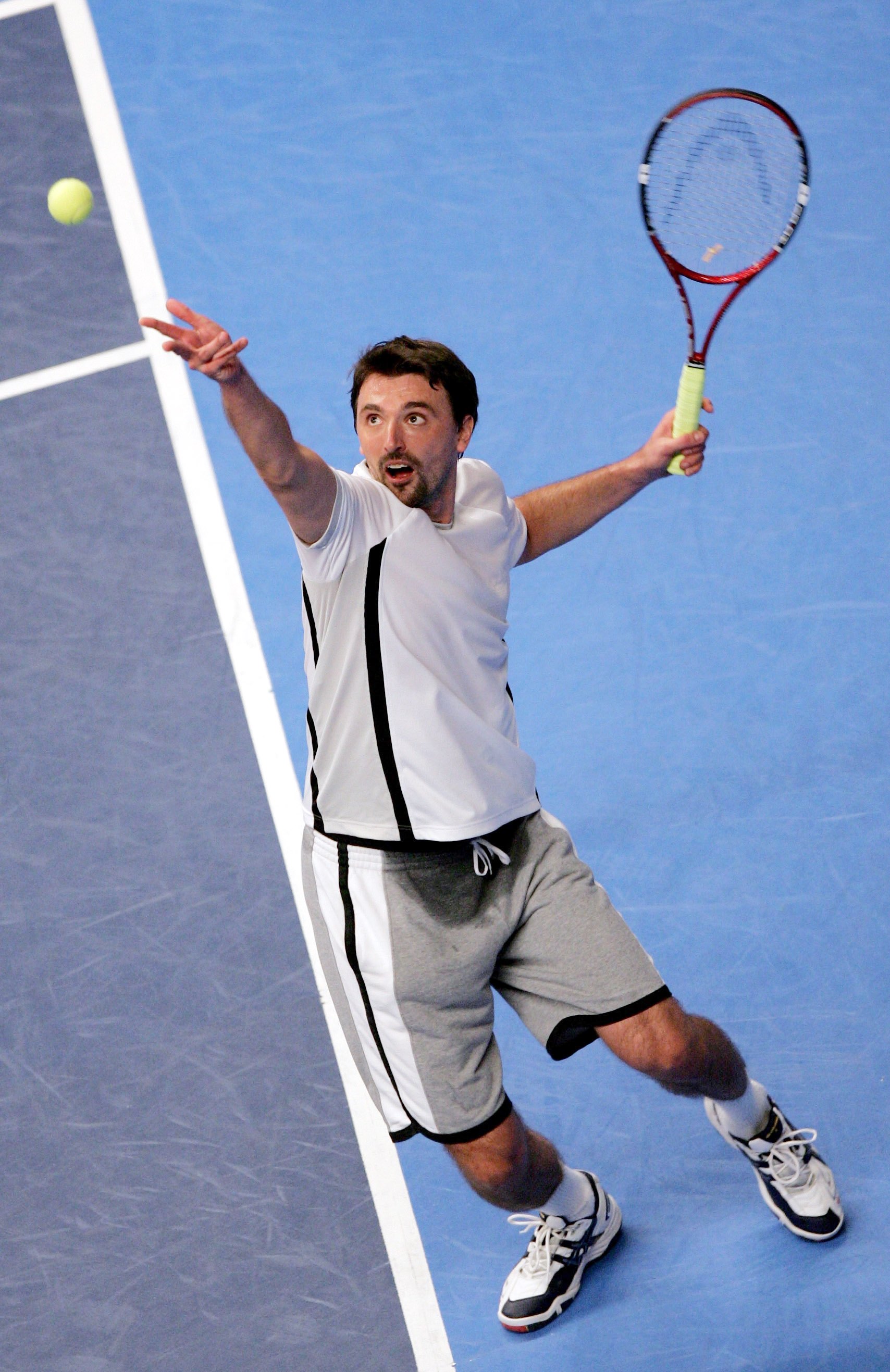 LONDON - DECEMBER 08:  Goran Ivanisevic of Croatia in serves against Jeremy Bates of Great Britain during The BlackRock Masters at the Royal Albert Hall on December 8, 2006 in London, England.  (Photo by Christopher Lee/Getty Images)
