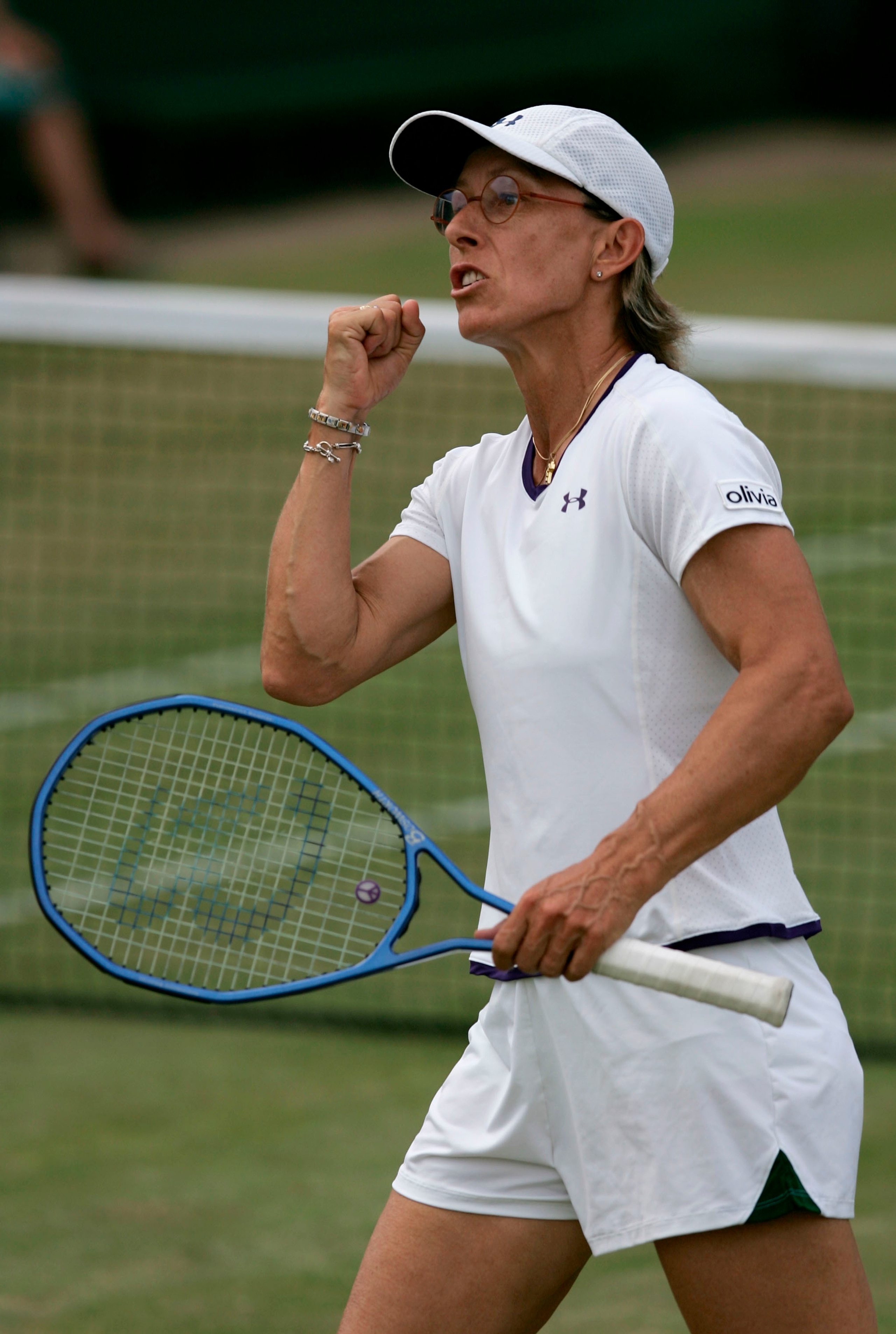 LONDON - JUNE 29:  Martina Navratilova of the USA celebrates winning a game during her doubles match with Anna-Lena Groenefeld of Germany against Vera Douchevina of Russia and Shahar Peer of Israel in the Ladies Doubles during the ninth day of the Wimbled