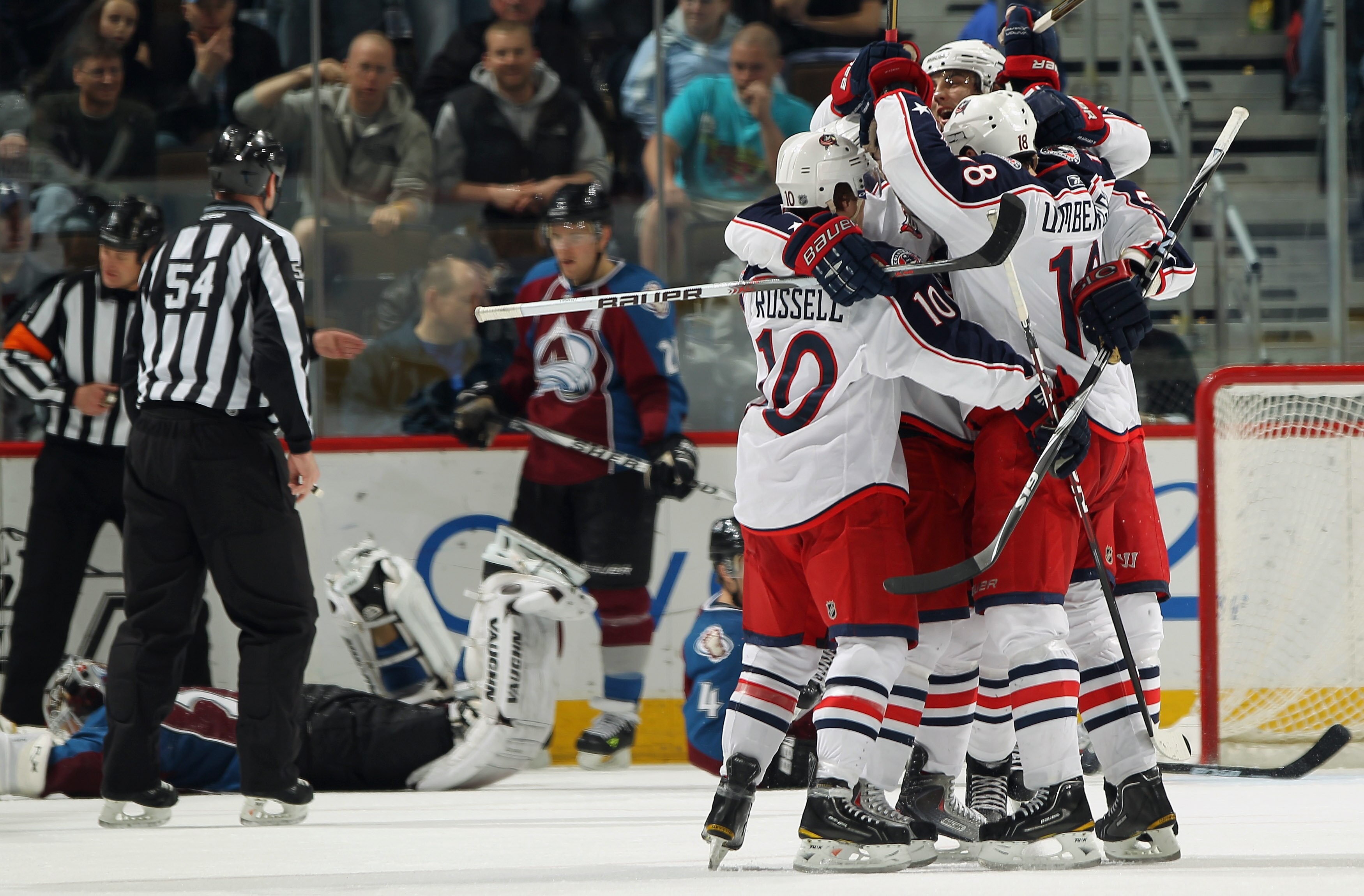 DENVER, CO - MARCH 22:  R.J. Umberger #18 of the Columbus Blue Jackets celebrates his third period goal with his teammates to give the Blue Jackets a 4-3 lead over the Colorado Avalanche at the Pepsi Center on March 22, 2011 in Denver, Colorado. The Avala