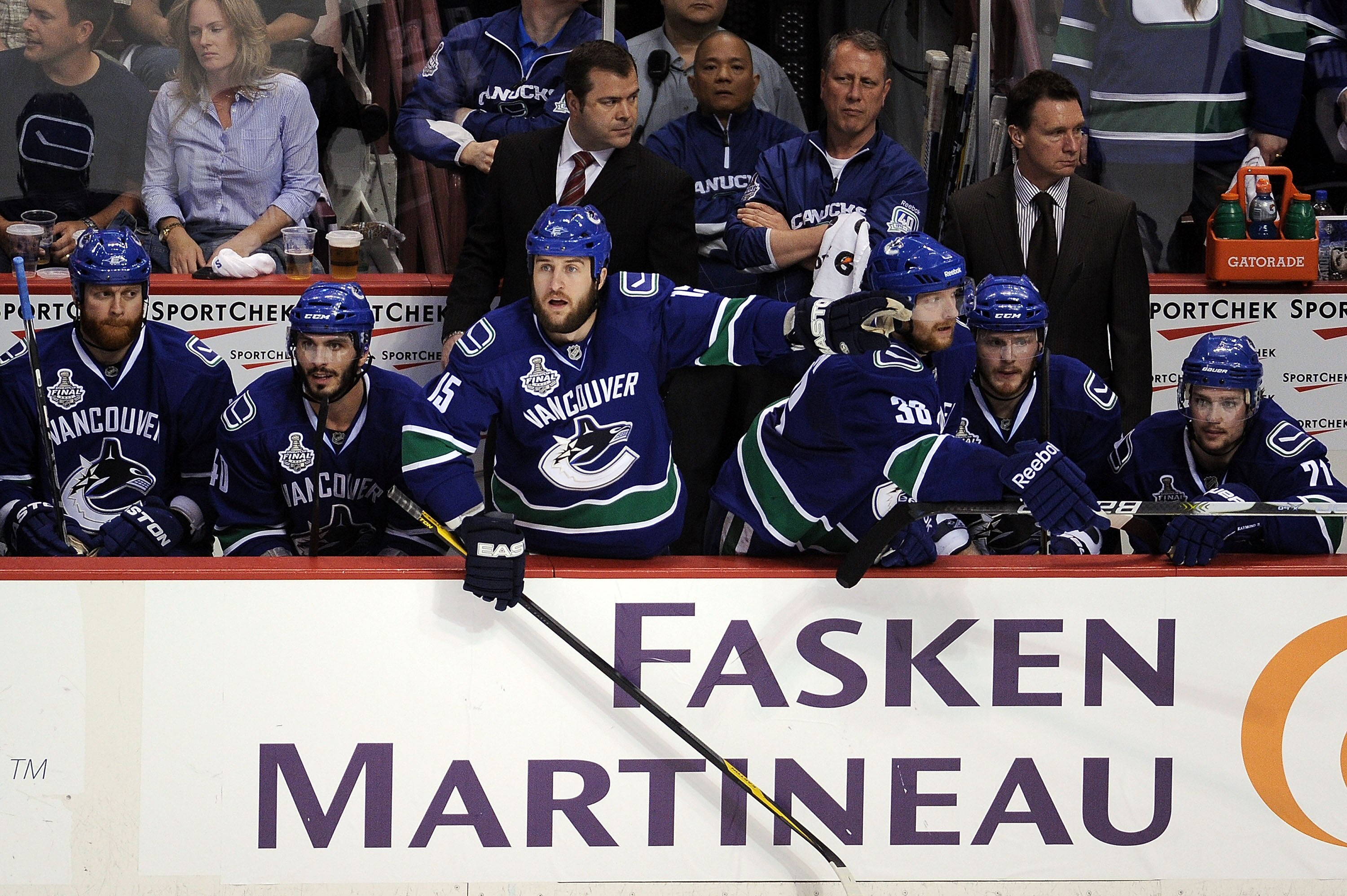 VANCOUVER, BC - JUNE 10:  Tanner Glass #15 of the Vancouver Canucks points during Game Five of the 2011 NHL Stanley Cup Final at Rogers Arena on June 10, 2011 in Vancouver, British Columbia, Canada.  (Photo by Harry How/Getty Images)