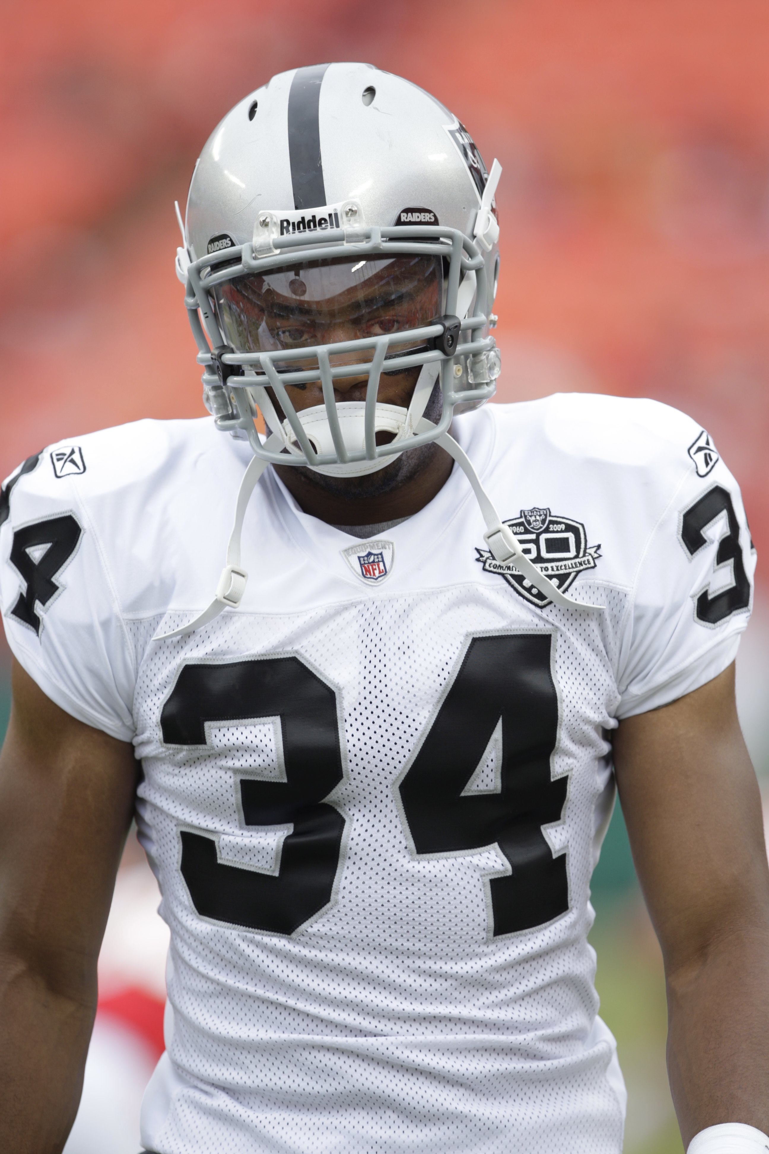 KANSAS CITY, MO - SEPTEMBER 20:  Mike Mitchell #34 of the Oakland Raiders looks on before the game against the Kansas City Chiefs at Arrowhead Stadium on September 20, 2009 in Kansas City, Missouri. (Photo by Jamie Squire/Getty Images)