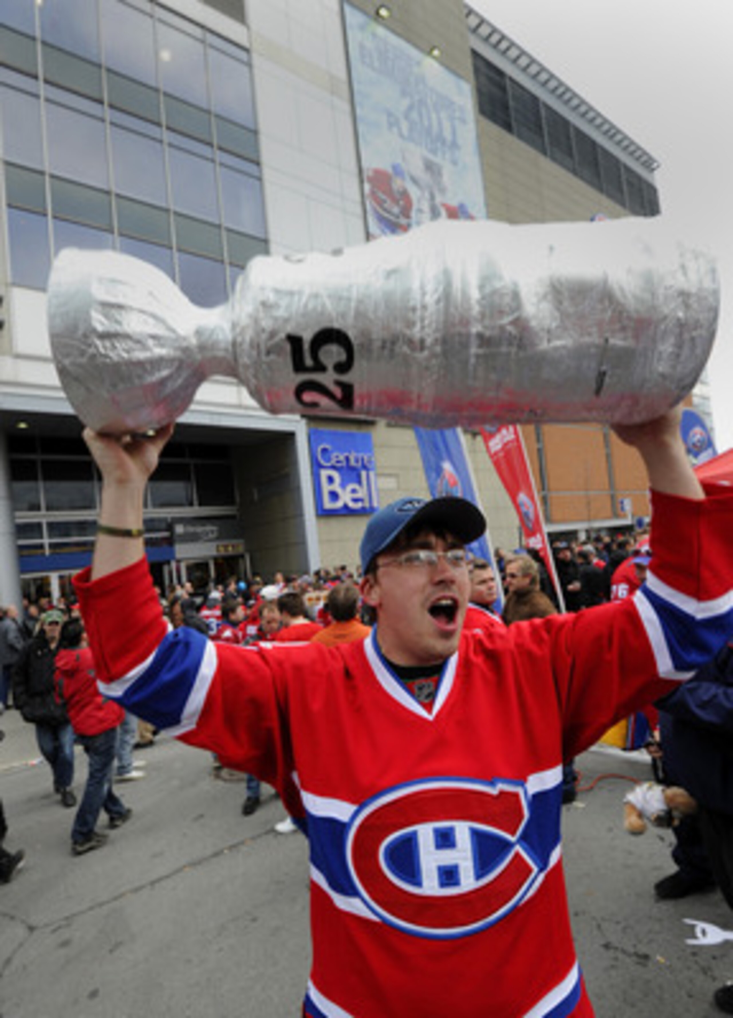 MONTREAL, CANADA - APRIL 18:  Jean-Francois Boudreau celebrates with other fans before Game Three of the Eastern Conference Quarterfinals between the Boston Bruins and the Montreal Canadiens during the 2011 NHL Stanley Cup Playoffs at the Bell Centre on A
