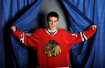 LOS ANGELES, CA - JUNE 25:  Kevin Hayes, drafted 24th overall by the Chicago Blackhawks, poses on stage during the 2010 NHL Entry Draft at Staples Center on June 25, 2010 in Los Angeles, California.  (Photo by Harry How/Getty Images)