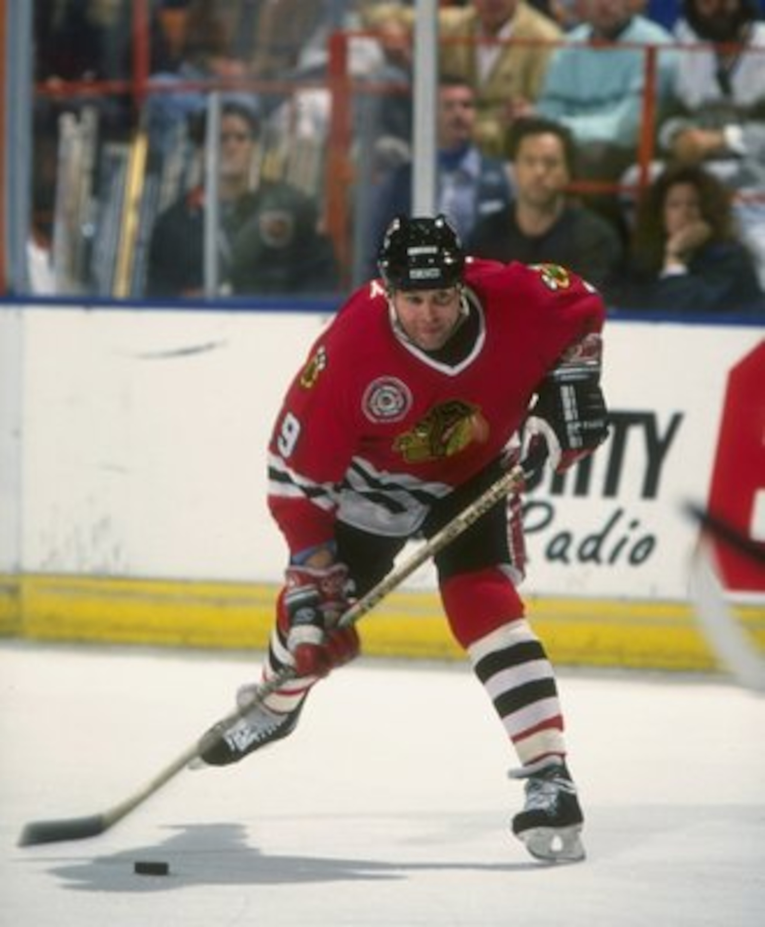 1990-1991:  Center Troy Murray of the Chicago Blackhawks moves the puck during a game against the Los Angeles Kings at the Great Western Forum in Inglewood, California. Mandatory Credit: Mike Powell  /Allsport
