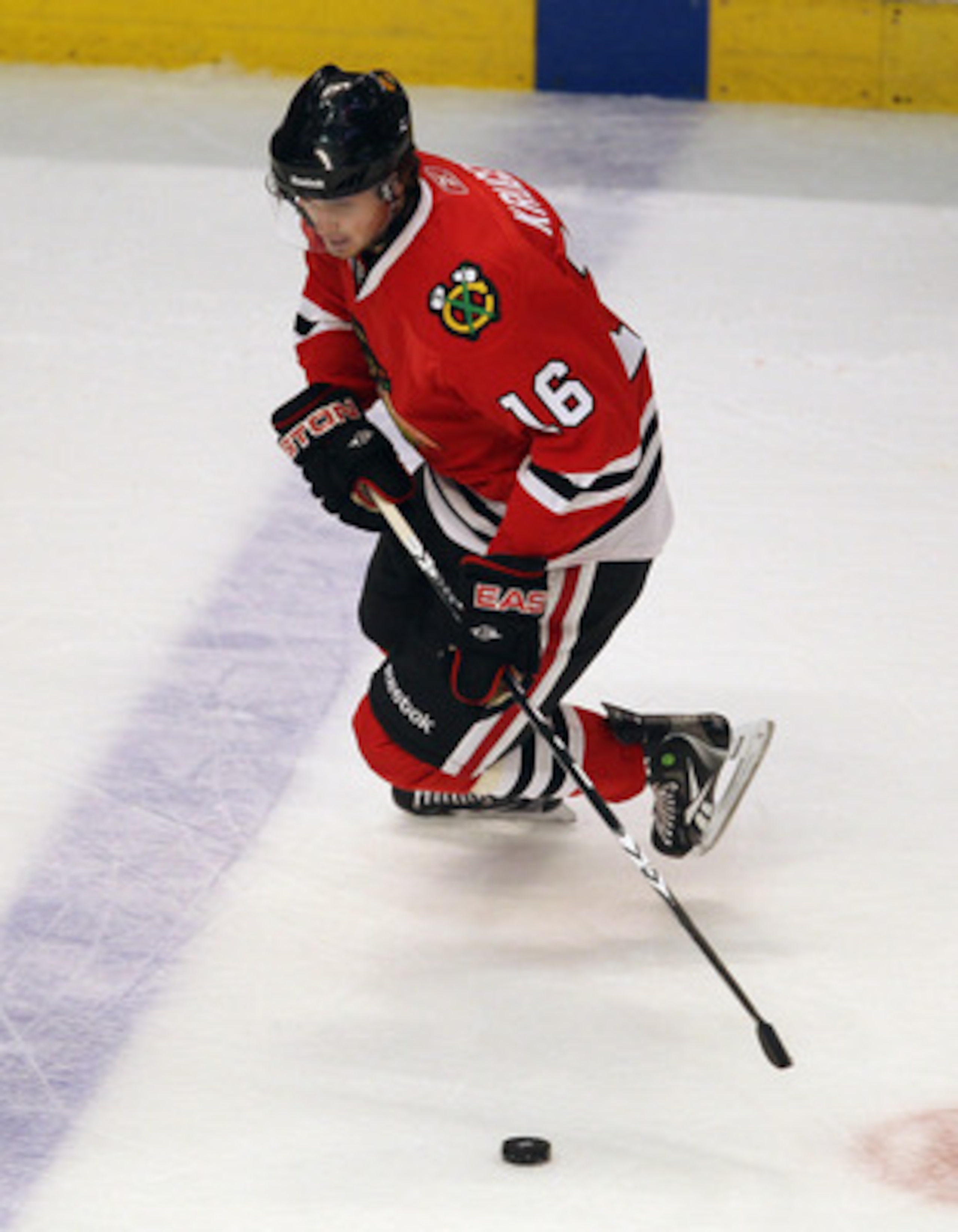 CHICAGO, IL - APRIL 19: Marcus Kruger #16 of the Chicago Blackhawks controls the puck against the Vancouver Canucks in Game Four of the Western Conference Quarterfinals during the 2011 NHL Stanley Cup Playoffs at the United Center on April 19, 2011 in Chi