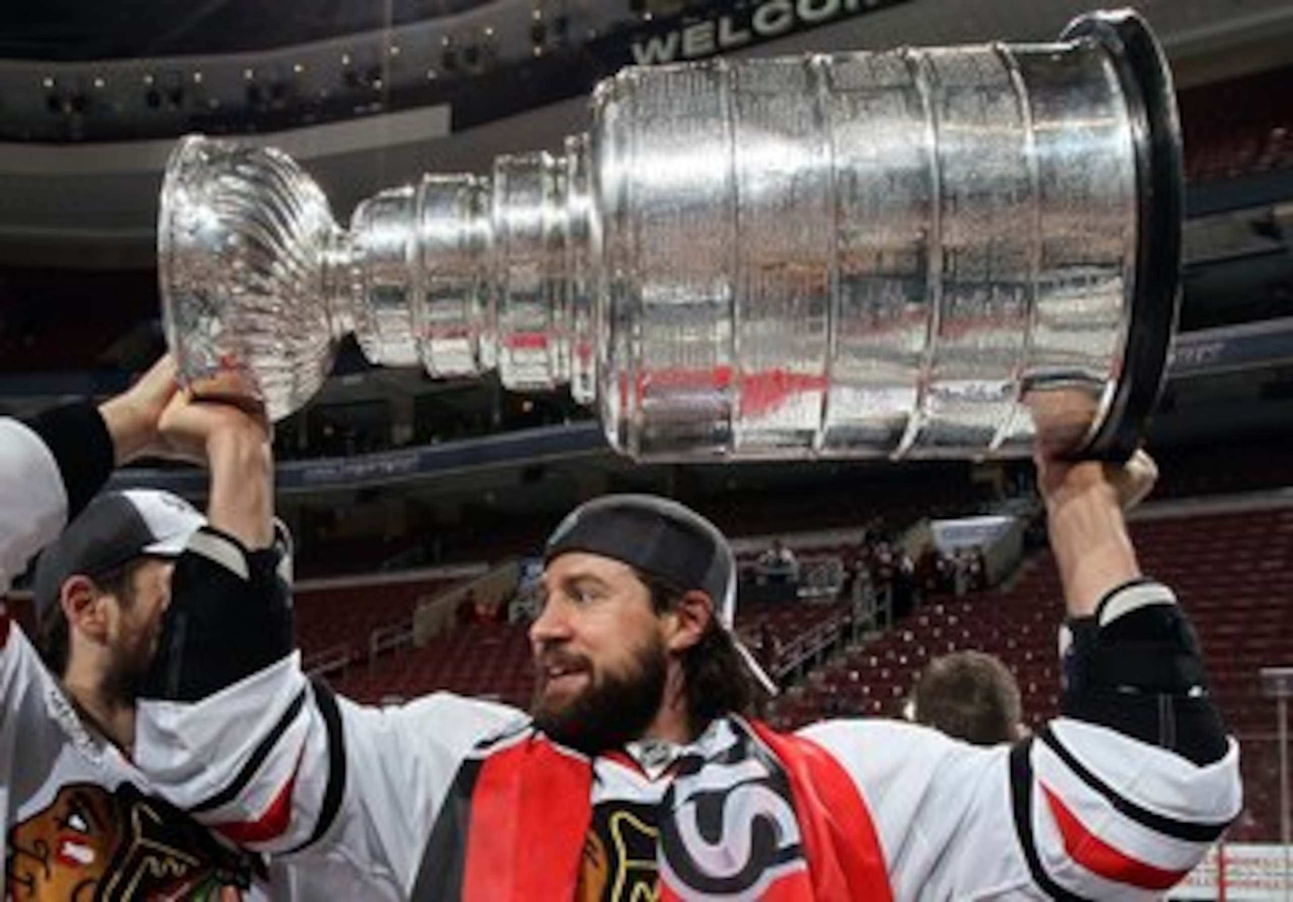 PHILADELPHIA - JUNE 09:  Adam Burish #37 of the Chicago Blackhawks hoists the Stanley Cup after teammate Patrick Kane scored the game-winning goal in overtime to defeat the Philadelphia Flyers 4-3 and win the Stanley Cup in Game Six of the 2010 NHL Stanle