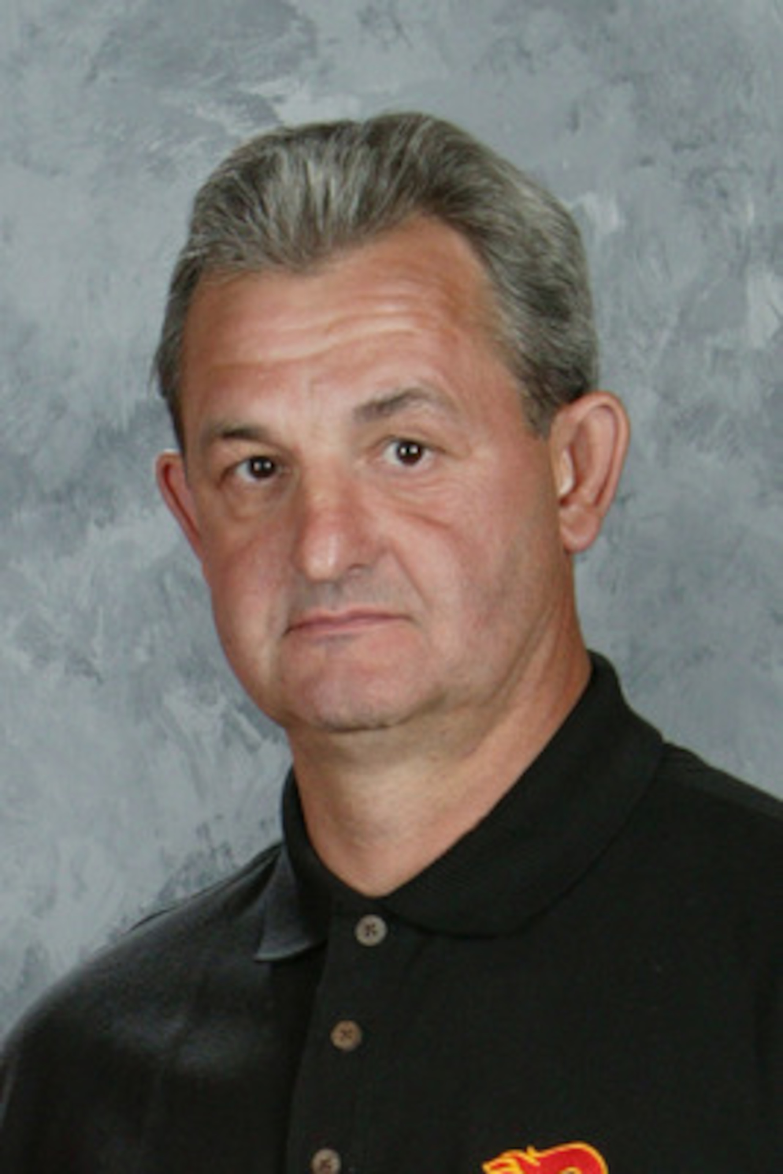 CALGARY - SEPTEMBER 12:  Darryl Sutter of the Calgary Flames poses for a portrait at Don Hartman Arena on September 12,2005 in Calgary, Canada. (Photo by: Gerry Thomas/Getty Images)