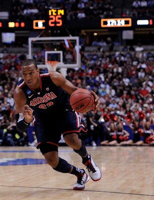 ANAHEIM, CA - MARCH 24: Derrick Williams #23 of the Arizona Wildcats handles the ball against Mason Plumlee #5 of the Duke Blue Devils during the west regional semifinal of the 2011 NCAA men's basketball tournament at the Honda Center on March 24, 2011 i ANAHEIM, CA - MARCH 24: Derrick Williams #23 of the Arizona Wildcats handles the ball against Mason Plumlee #5 of the Duke Blue Devils during the west regional semifinal of the 2011 NCAA men's basketball tournament at the Honda Center on March 24, 2011 i