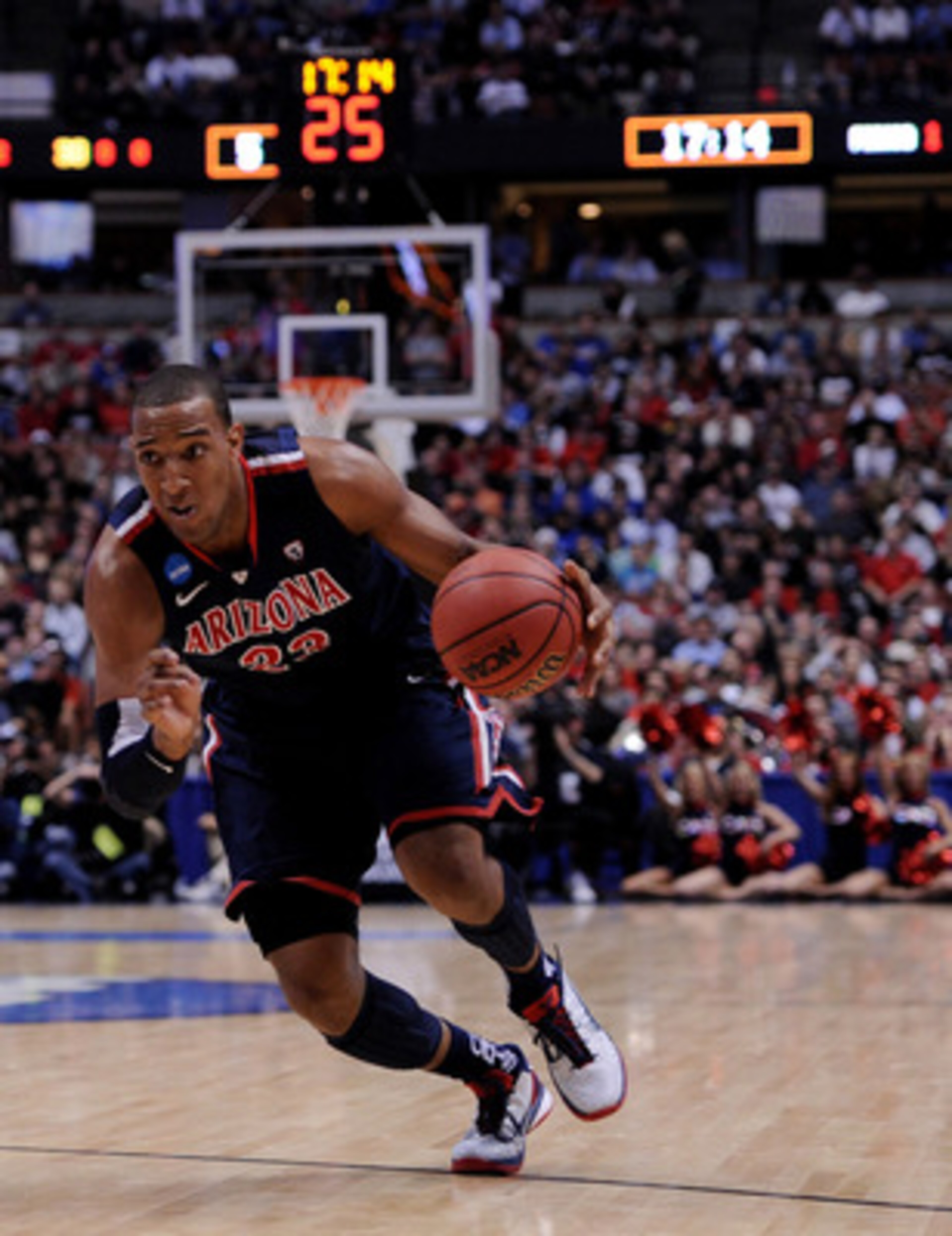 ANAHEIM, CA - MARCH 24:  Derrick Williams #23 of the Arizona Wildcats handles the ball against Mason Plumlee #5 of the Duke Blue Devils during the west regional semifinal of the 2011 NCAA men's basketball tournament at the Honda Center on March 24, 2011 i
