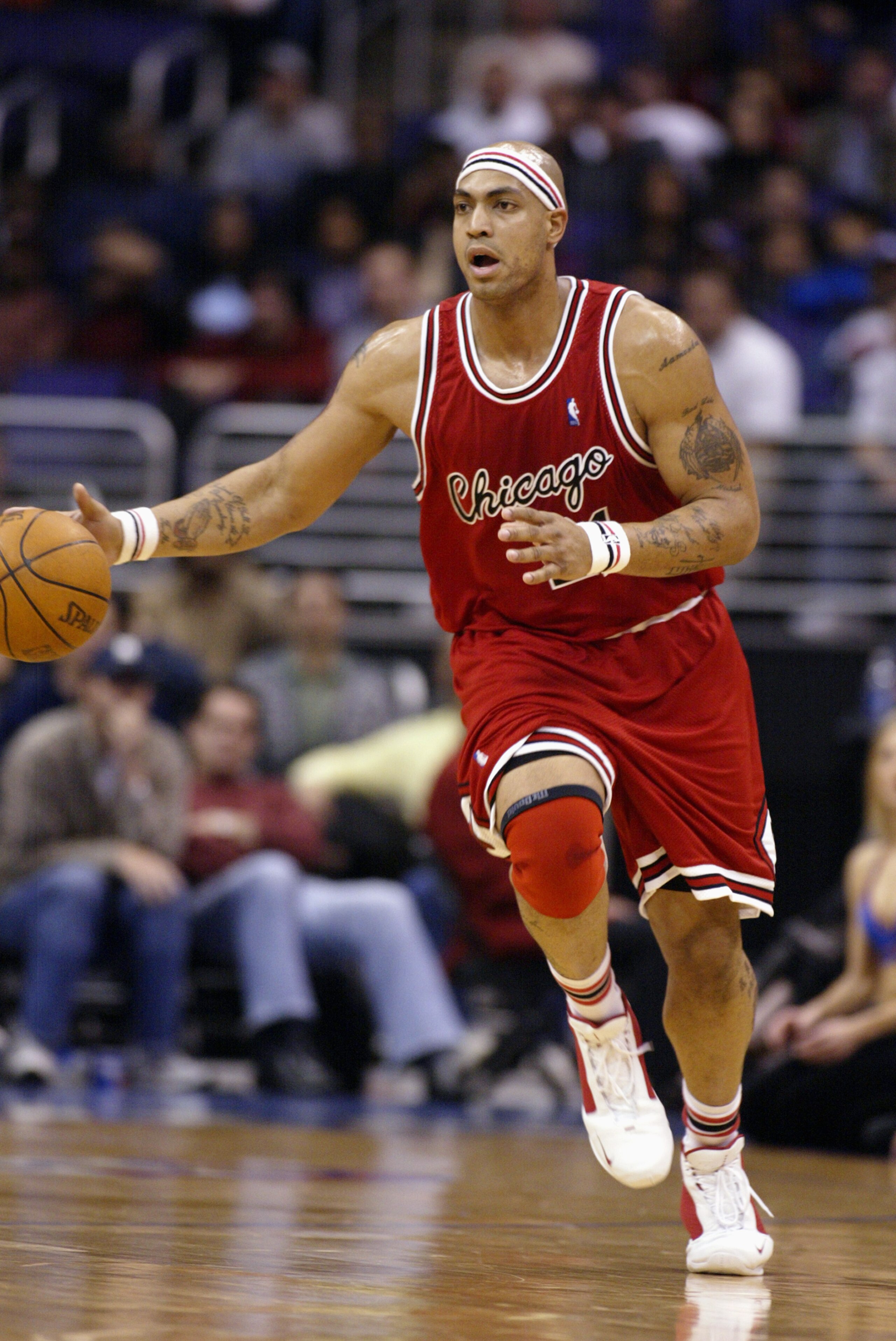 LOS ANGELES - JANUARY 27:  Marcus Fizer #21 of the Chicago Bulls drives upcourt during the game against the Los Angeles Clippers at Staples Center on January 27, 2004 in Los Angeles, California.  The Clippers won 102-92.  NOTE TO USER: User expressly ackn