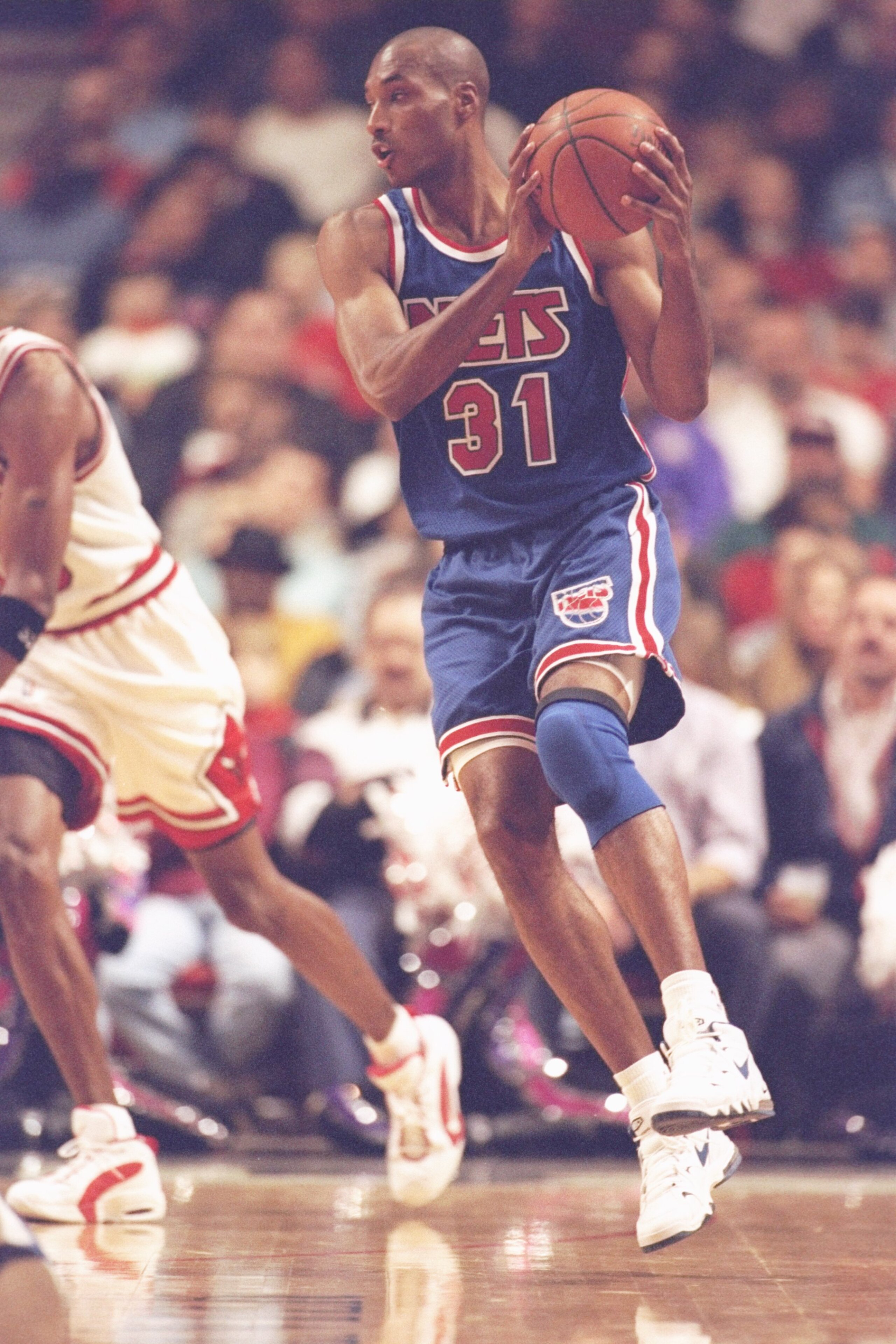 17 Nov 1995:  Forward Ed O''Bannon of the New Jersey Nets moves the ball during a game against the Chicago Bulls at the United Center in Chicago, Illinois.  The Bulls won the game, 109-94. Mandatory Credit: Jonathan Daniel  /Allsport