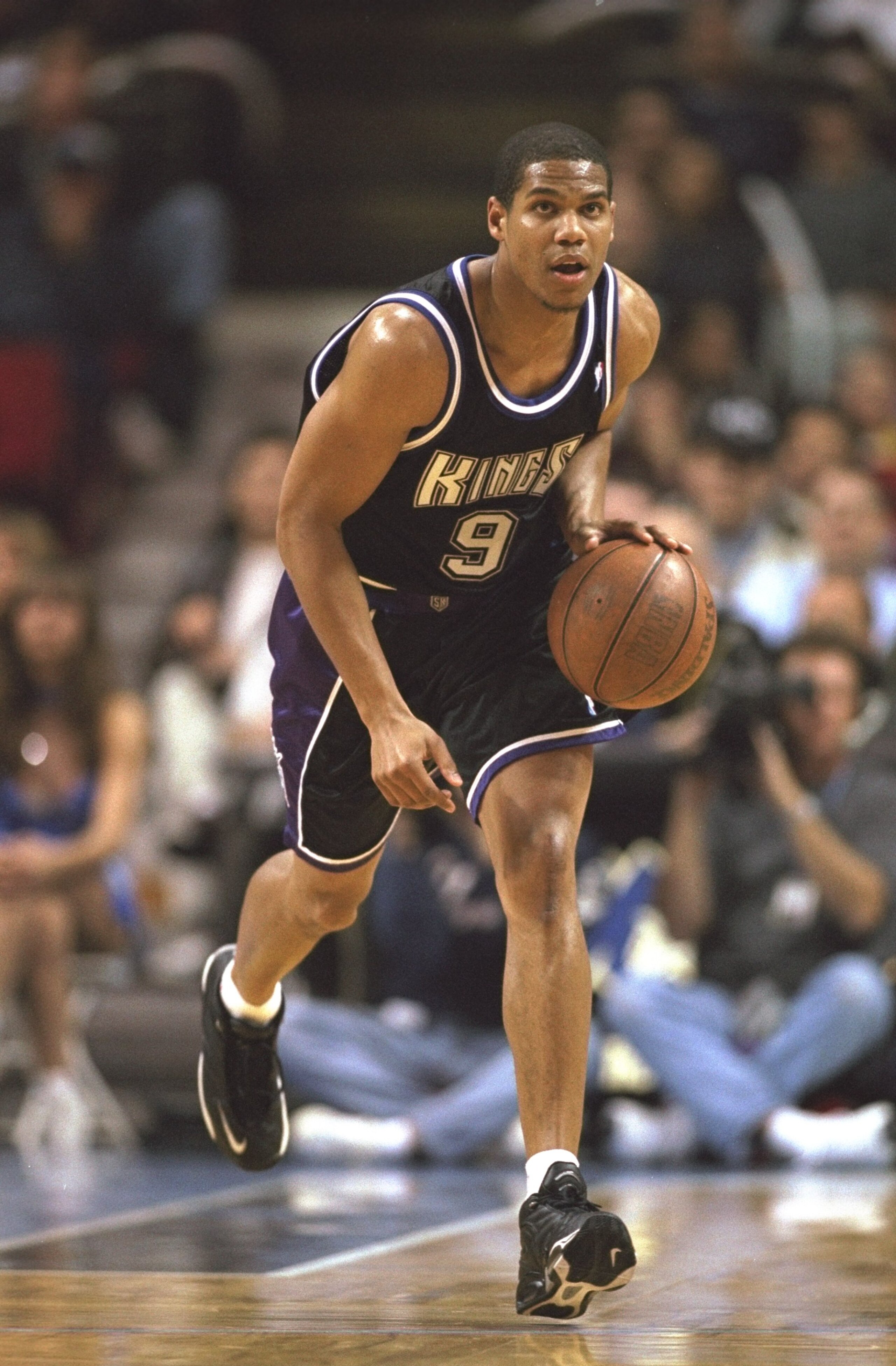 22 Feb 1999: Tariq Abdul-Wahad #9 of the Sacramento Kings dribbles the ball during the game against the Orlando Magic at the Orlando Arena in Orlando, Florida. The Magic defeated the Kings 107-96.  Mandatory Credit: Andy Lyons  /Allsport