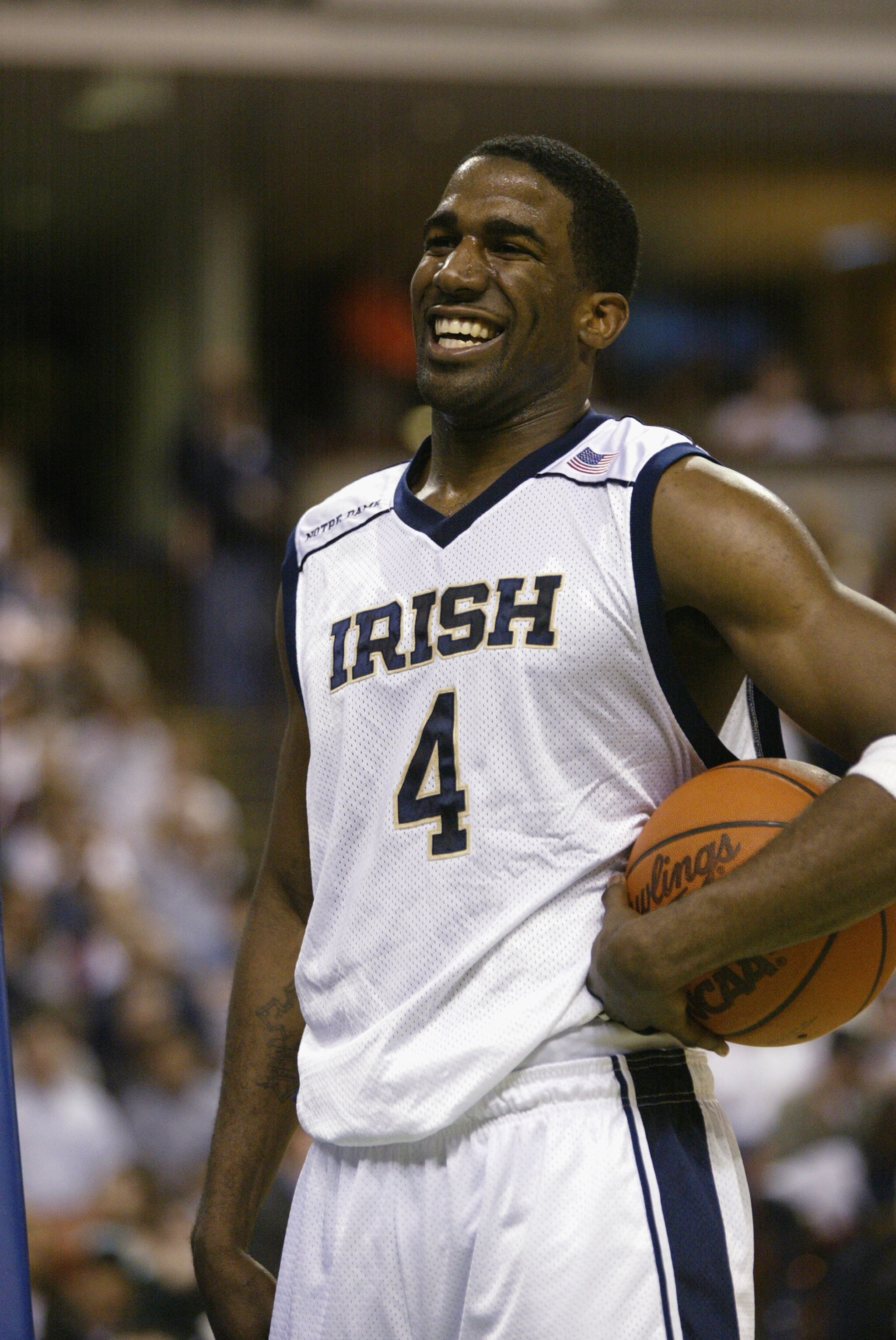 GREENVILLE, SC - MARCH 14:  Ryan Humphrey #4 of the Notre Dame Fighting Irish grins on the court during the first round of the 2002 NCAA Division I Men's Basketball Tournament against the UNC Charlotte 49ers at Bi-Lo Center in Greenville, South Carolina o