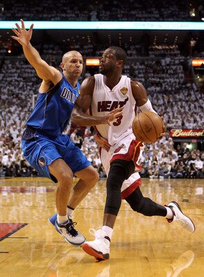 MIAMI, FL - JUNE 12:  Dwyane Wade #3 of the Miami Heat drives against Jason Kidd #2 of the Dallas Mavericks in Game Six of the 2011 NBA Finals at American Airlines Arena on June 12, 2011 in Miami, Florida. NOTE TO USER: User expressly acknowledges and agr