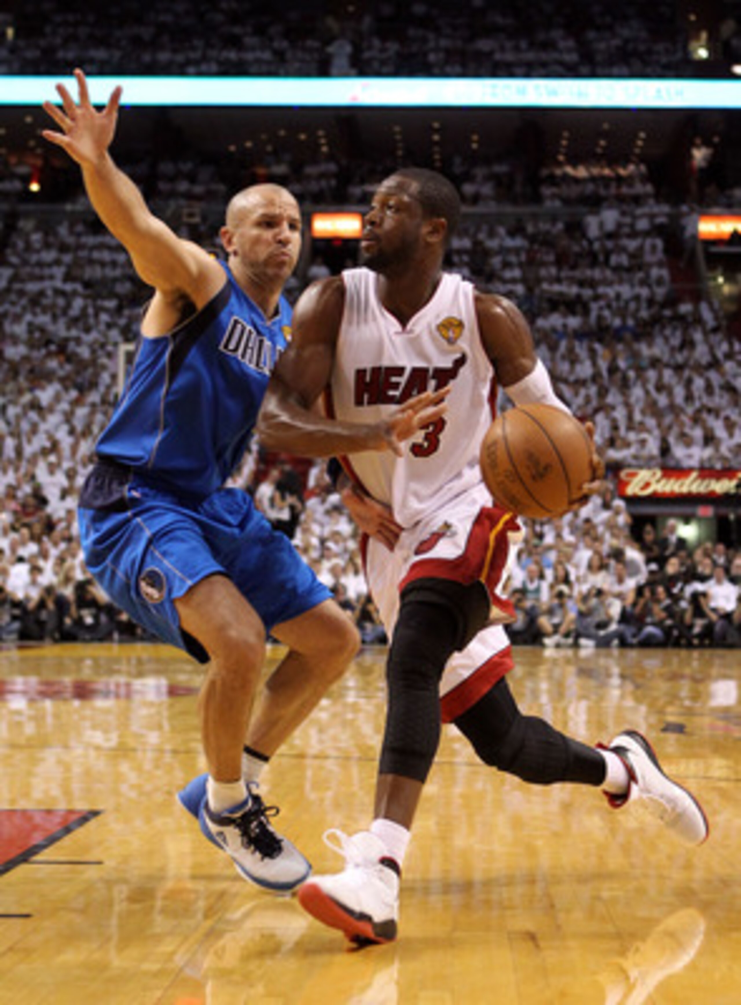 MIAMI, FL - JUNE 12:  Dwyane Wade #3 of the Miami Heat drives against Jason Kidd #2 of the Dallas Mavericks in Game Six of the 2011 NBA Finals at American Airlines Arena on June 12, 2011 in Miami, Florida. NOTE TO USER: User expressly acknowledges and agr