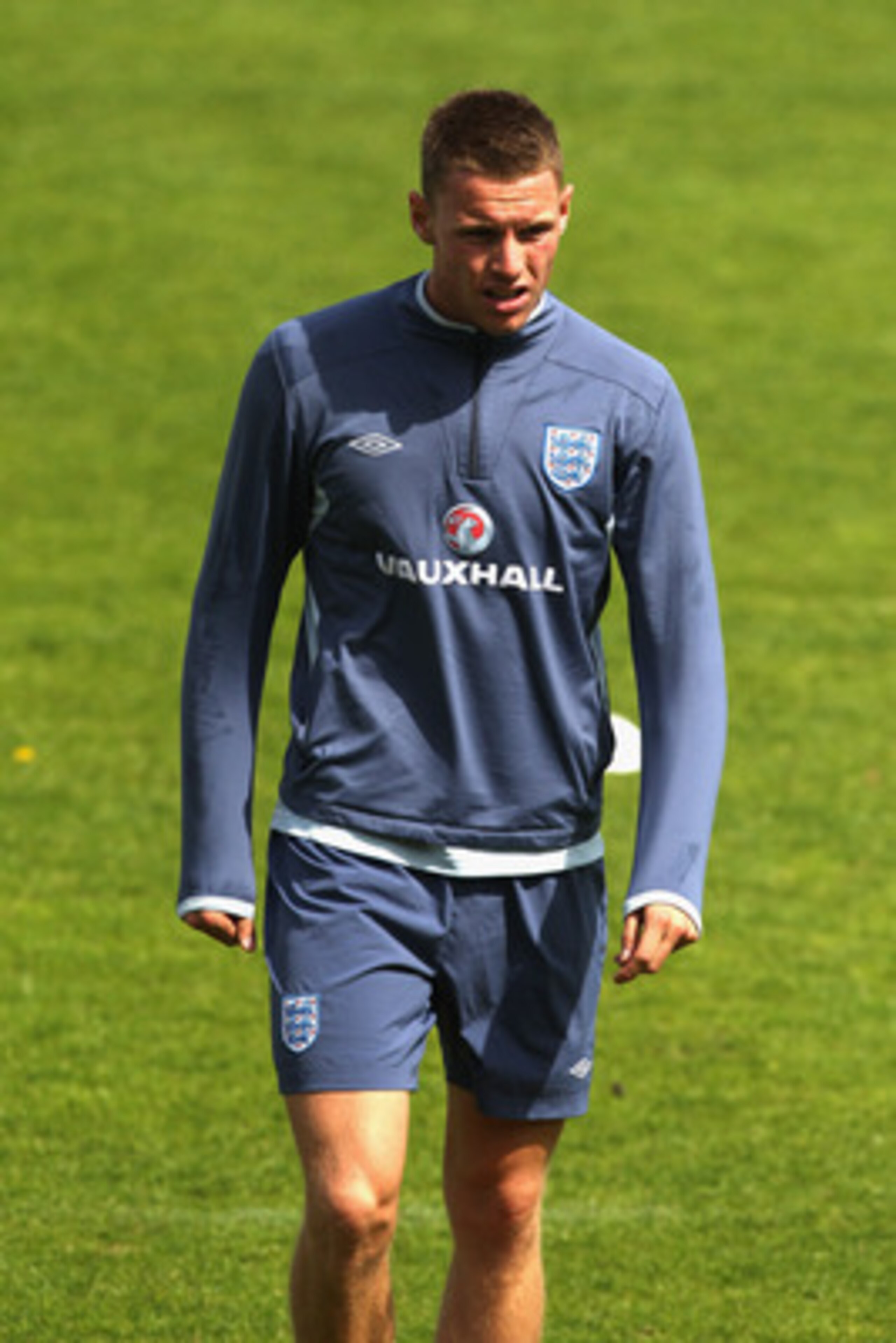 FREDERICIA, DENMARK - JUNE 09: Connor Wickham walks back to the dressing room after picking up an injury during the England under 21's training session at Monjasa Park stadium on June 9, 2011 in Fredericia, Denmark.  (Photo by Ian Walton/Getty Images)