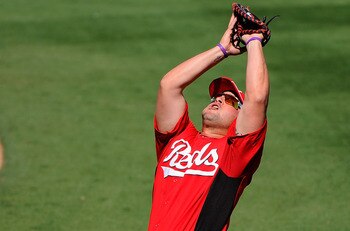 SCOTTSDALE, AZ - MARCH 14:  Yonder Alonso #23 of the Cincinnati Reds against the Colorodo Rockies during the spring training baseball game at Salt River Fields at Talking Stick on March 14, 2011 in Scottsdale, Arizona.  (Photo by Kevork Djansezian/Getty I