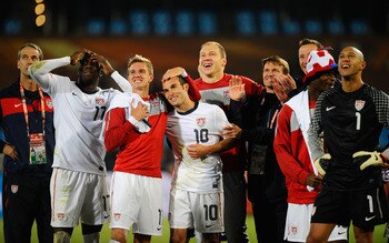 PRETORIA, SOUTH AFRICA - JUNE 23:  (L-R) Jozy Altidore, Stuart Holden, Landon Donovan and Tim Howard of the United States celebrate with team mates, the victory that sends the USA through to the second round in the 2010 FIFA World Cup South Africa Group C