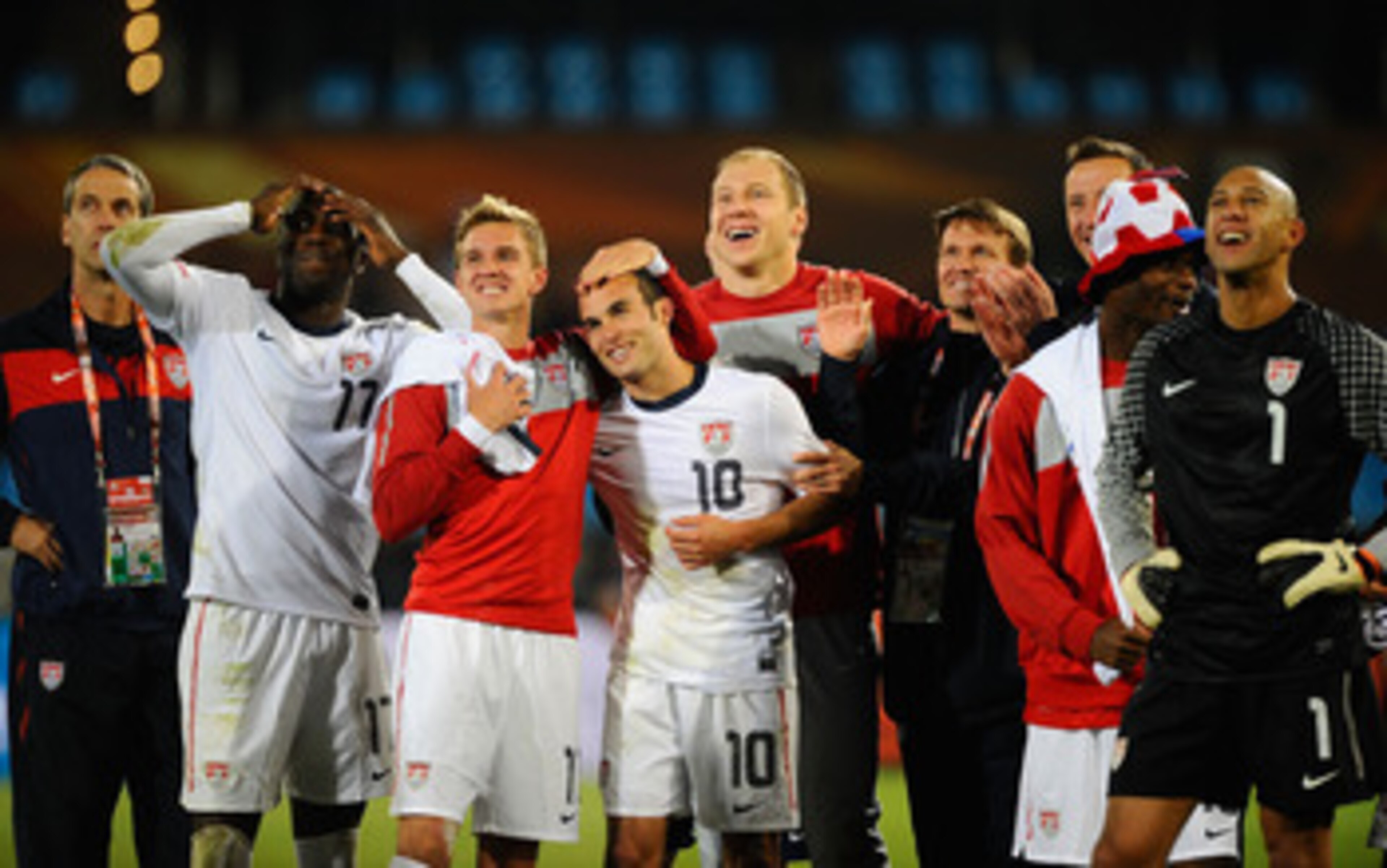 PRETORIA, SOUTH AFRICA - JUNE 23:  (L-R) Jozy Altidore, Stuart Holden, Landon Donovan and Tim Howard of the United States celebrate with team mates, the victory that sends the USA through to the second round in the 2010 FIFA World Cup South Africa Group C