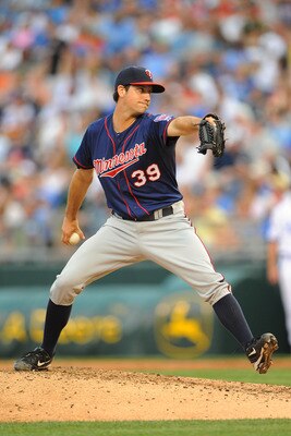 KANSAS CITY, MO - JUNE 4:  Reliever Anthony Slama #39 of the Minnesota Twins throws a pitch against the Kansas City Royals at Kauffman Stadium on June 4, 2011 in Kansas City, Missouri. (Photo by G. Newman Lowrance/Getty Images)