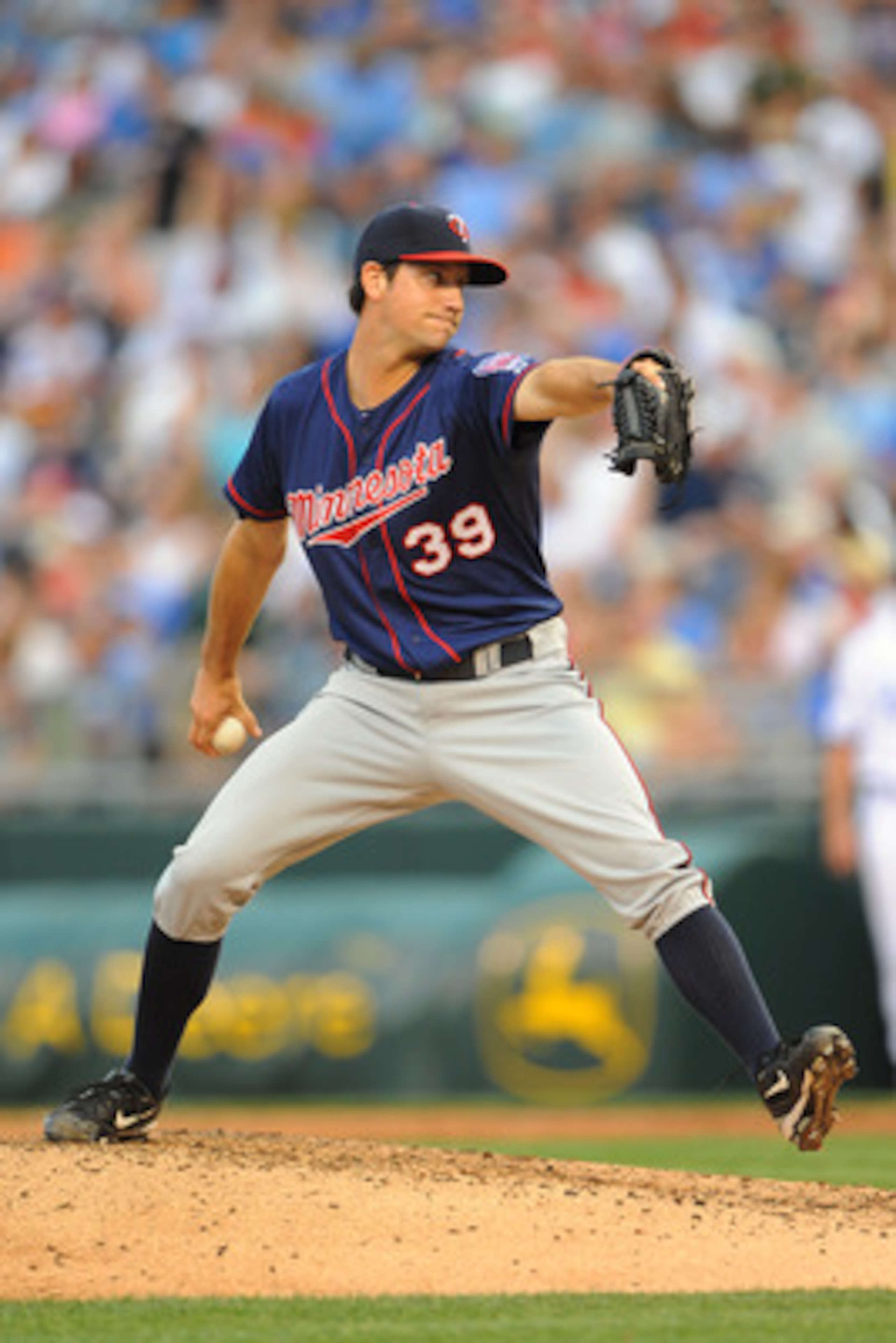 KANSAS CITY, MO - JUNE 4: Reliever Anthony Slama #39 of the Minnesota Twins throws a pitch against the Kansas City Royals at Kauffman Stadium on June 4, 2011 in Kansas City, Missouri. (Photo by G. Newman Lowrance/Getty Images) KANSAS CITY, MO - JUNE 4: Reliever Anthony Slama #39 of the Minnesota Twins throws a pitch against the Kansas City Royals at Kauffman Stadium on June 4, 2011 in Kansas City, Missouri. (Photo by G. Newman Lowrance/Getty Images)