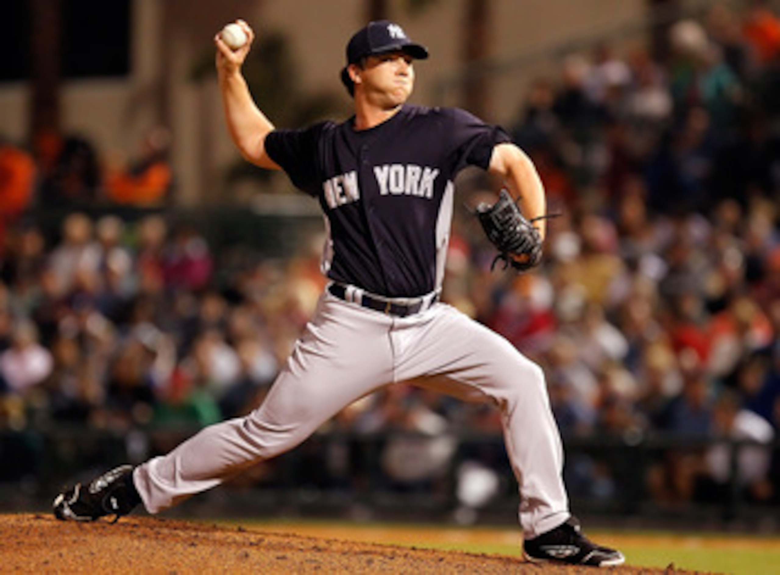 SARASOTA, FL - MARCH 07: Pitcher Adam Warren #88 of the New York Yankees pitches against the Baltimore Orioles during a Grapefruit League Spring Training Game at Ed Smith Stadium on March 7, 2011 in Sarasota, Florida. (Photo by J. Meric/Getty Images) SARASOTA, FL - MARCH 07: Pitcher Adam Warren #88 of the New York Yankees pitches against the Baltimore Orioles during a Grapefruit League Spring Training Game at Ed Smith Stadium on March 7, 2011 in Sarasota, Florida. (Photo by J. Meric/Getty Images)