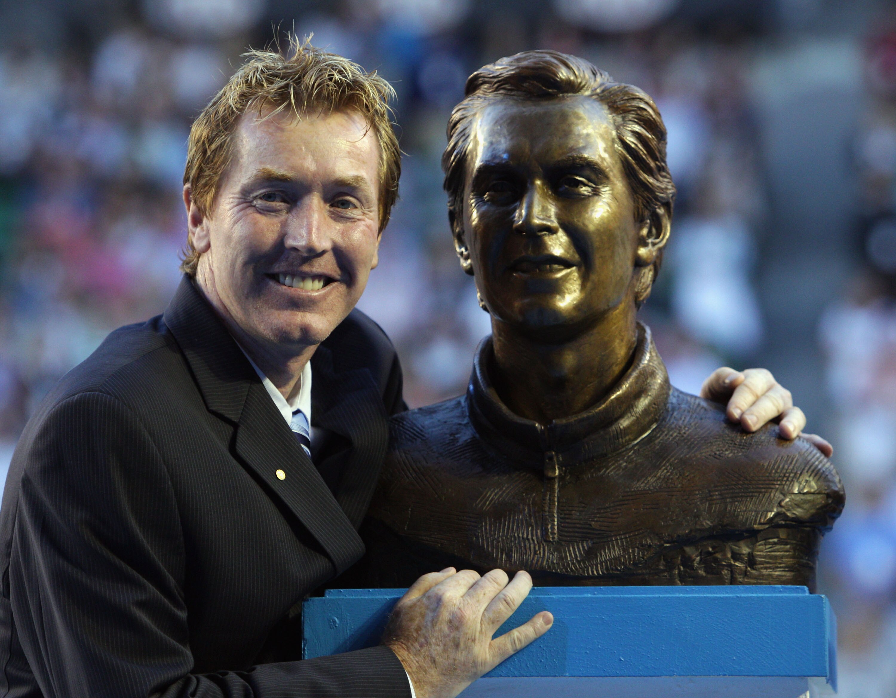 MELBOURNE, AUSTRALIA - JANUARY 26:  Former tennis player Mark Woodforde of Australia poses after being inducted into the Australian Tennis Hall of Fame during the Australia Day presentation in Rod Laver Arena during day nine of the 2010 Australian Open at