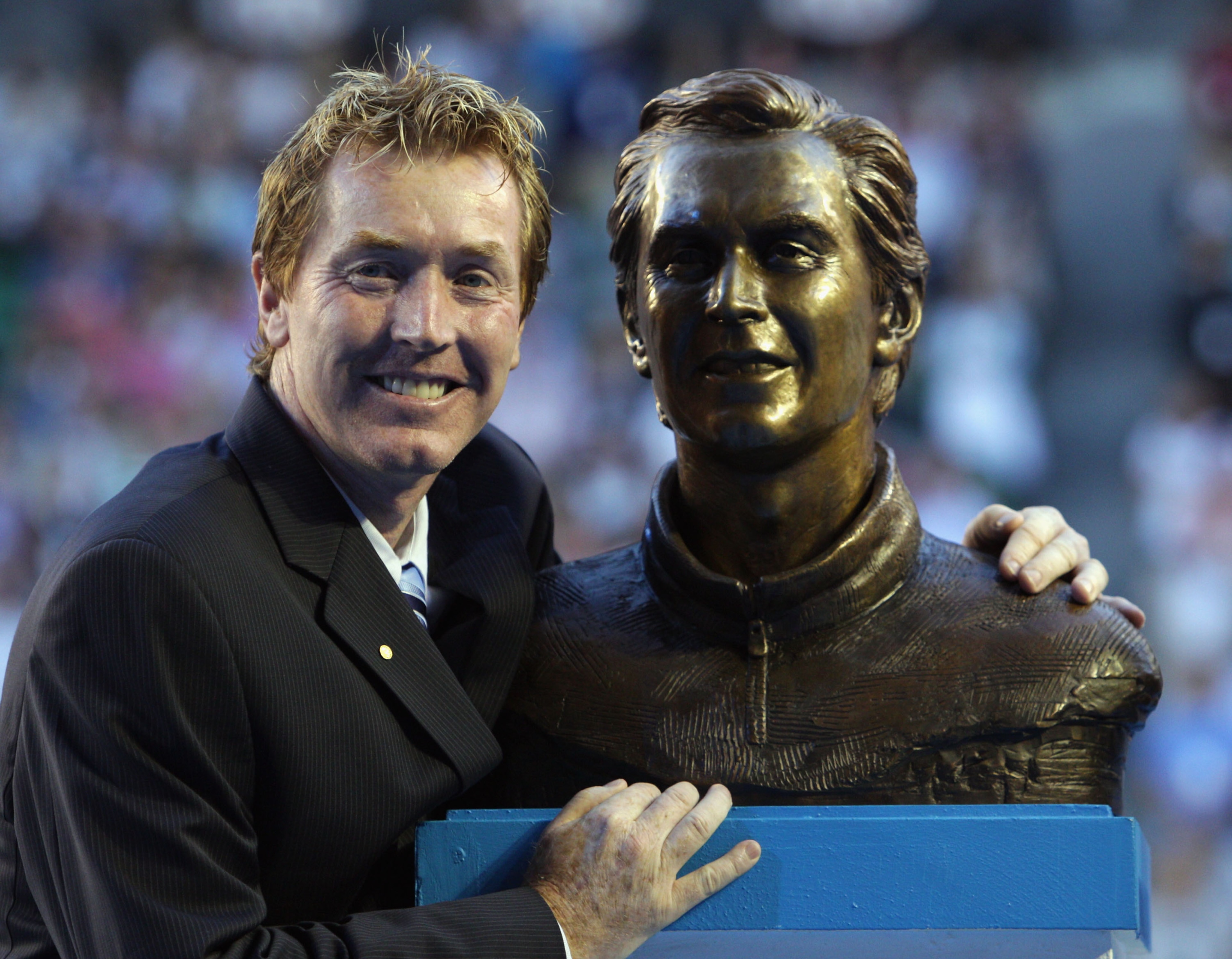 MELBOURNE, AUSTRALIA - JANUARY 26: Former tennis player Mark Woodforde of Australia poses after being inducted into the Australian Tennis Hall of Fame during the Australia Day presentation in Rod Laver Arena during day nine of the 2010 Australian Open at MELBOURNE, AUSTRALIA - JANUARY 26: Former tennis player Mark Woodforde of Australia poses after being inducted into the Australian Tennis Hall of Fame during the Australia Day presentation in Rod Laver Arena during day nine of the 2010 Australian Open at