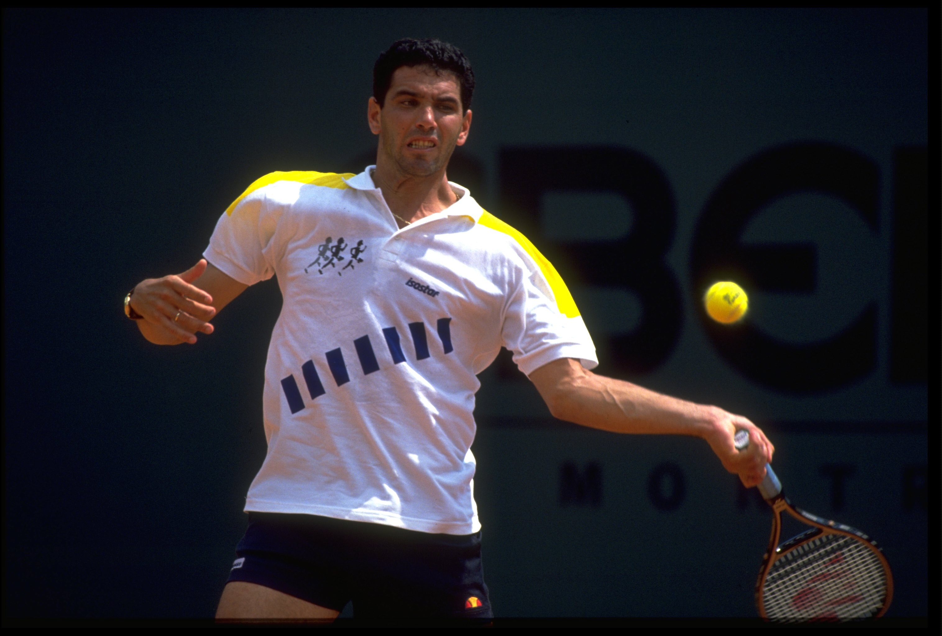 APR 1990:  ANDRES GOMEZ OF ECUADOR PLAYS A BACKHAND STROKE DURING A MATCH AT THE 1990 MONTE CARLO OPEN.