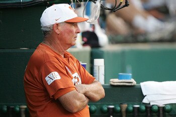 OMAHA, NE - JUNE 25:  Manager Augie Garrido #16 of the Texas Longhorns looks on from the dugout against the Florida Gators during Game 1 of the championship series of the 59th College World Series at Rosenblatt Stadium on June 25, 2005 in Omaha, Nebraska.