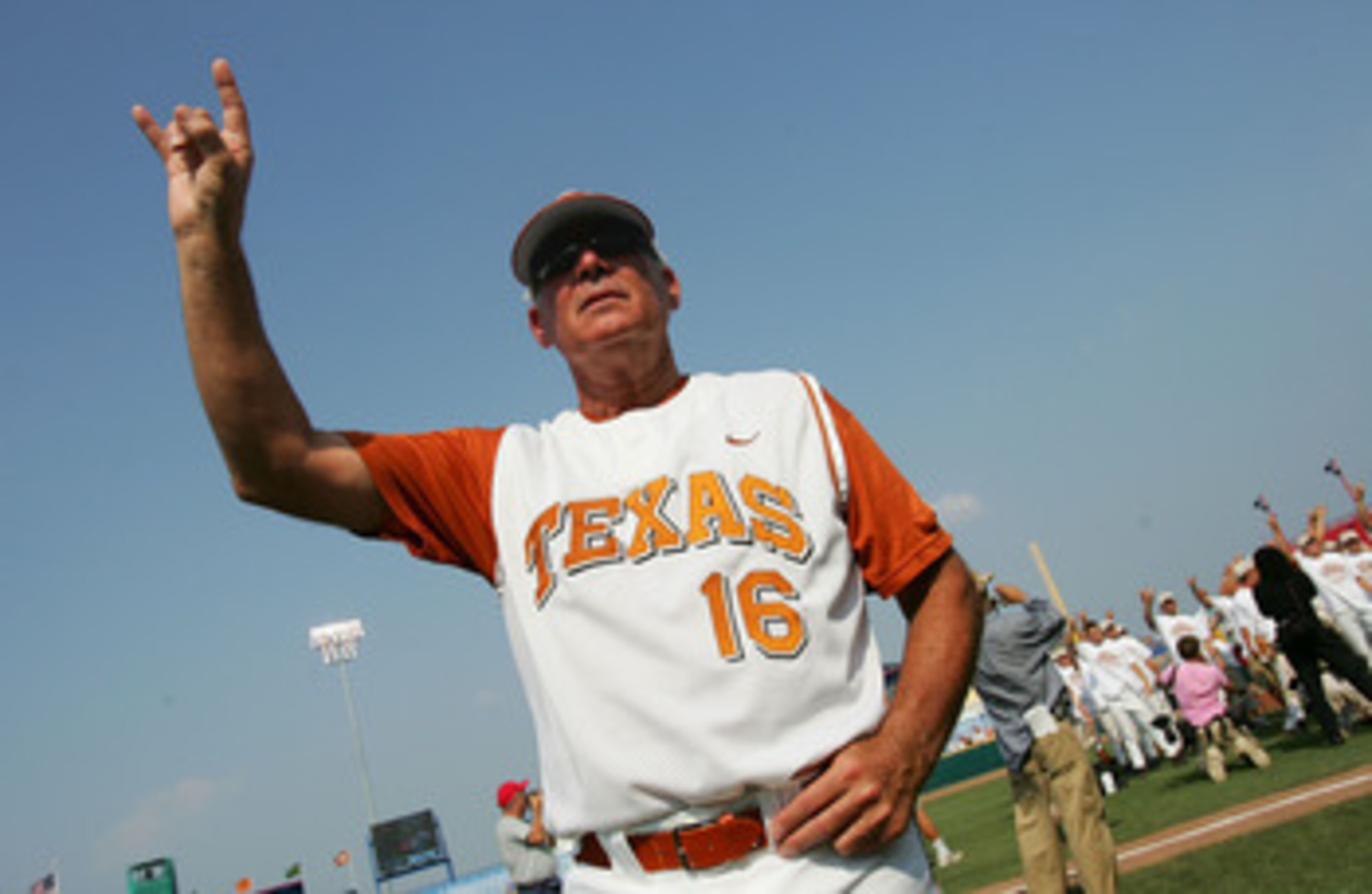 OMAHA, NE - JUNE 26: Head coach Augie Garrido #16 of the Texas Longhorns celebrate after defeating the Florida Gators during Game 2 of the championship series of the 59th College World Series at Rosenblatt Stadium on June 26, 2005 in Omaha, Nebraska. (P OMAHA, NE - JUNE 26: Head coach Augie Garrido #16 of the Texas Longhorns celebrate after defeating the Florida Gators during Game 2 of the championship series of the 59th College World Series at Rosenblatt Stadium on June 26, 2005 in Omaha, Nebraska. (P