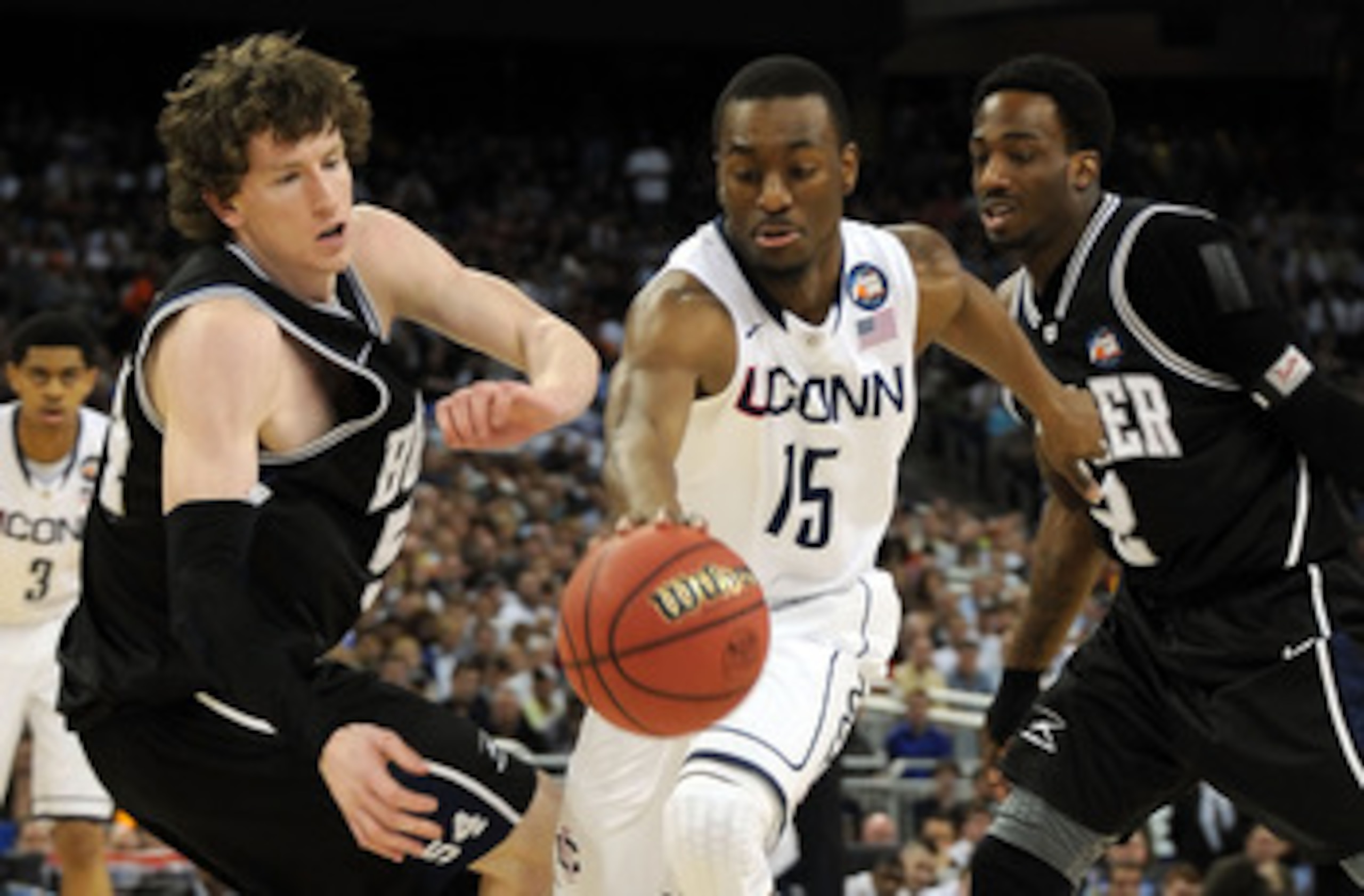 HOUSTON, TX - APRIL 04: Kemba Walker #15 of the Connecticut Huskies fights for the ball against Matt Howard #54 and Shawn Vanzant #2 of the Butler Bulldogs during the National Championship Game of the 2011 NCAA Division I Men's Basketball Tournament at R HOUSTON, TX - APRIL 04: Kemba Walker #15 of the Connecticut Huskies fights for the ball against Matt Howard #54 and Shawn Vanzant #2 of the Butler Bulldogs during the National Championship Game of the 2011 NCAA Division I Men's Basketball Tournament at R