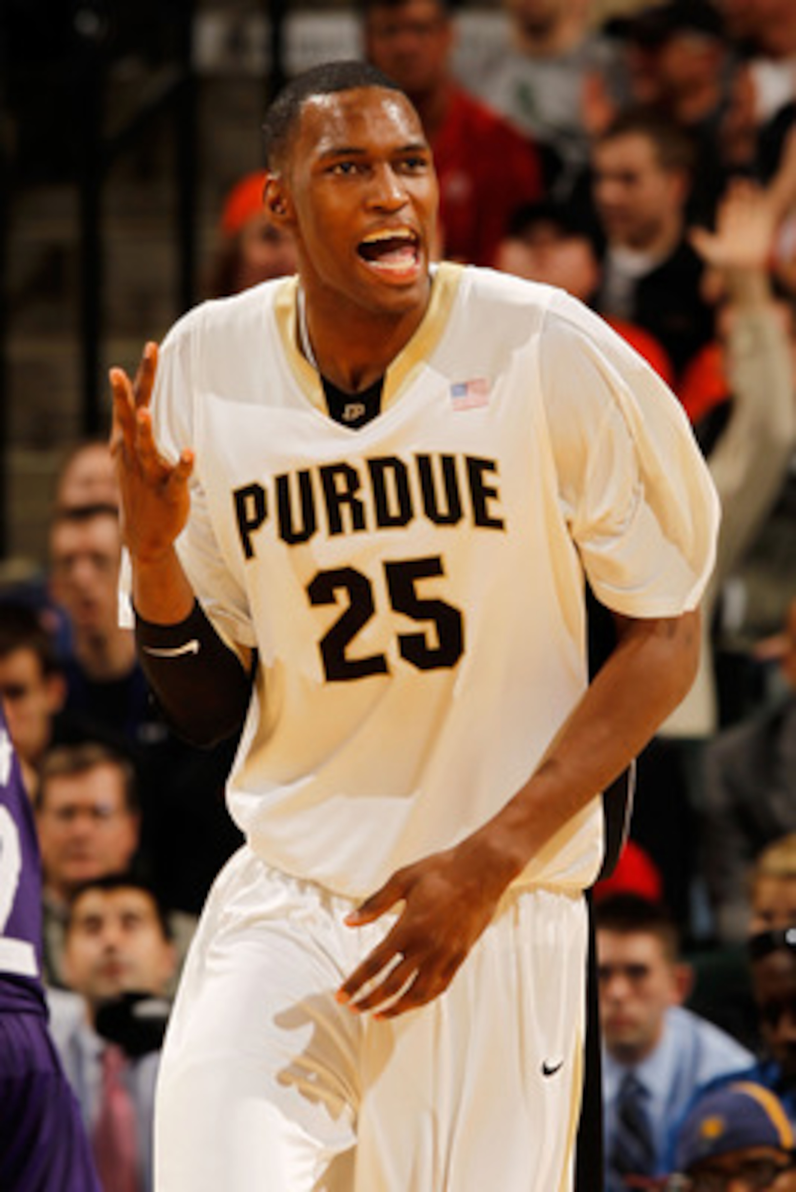 INDIANAPOLIS - MARCH 12: Center JuJuan Johnson #25 of the Purdue Boilermakers celebrates after a play against the Northwestern Wildcats during the quarterfinals of the Big Ten Men's Basketball Tournament at Conseco Fieldhouse on March 12, 2010 in Indiana INDIANAPOLIS - MARCH 12: Center JuJuan Johnson #25 of the Purdue Boilermakers celebrates after a play against the Northwestern Wildcats during the quarterfinals of the Big Ten Men's Basketball Tournament at Conseco Fieldhouse on March 12, 2010 in Indiana