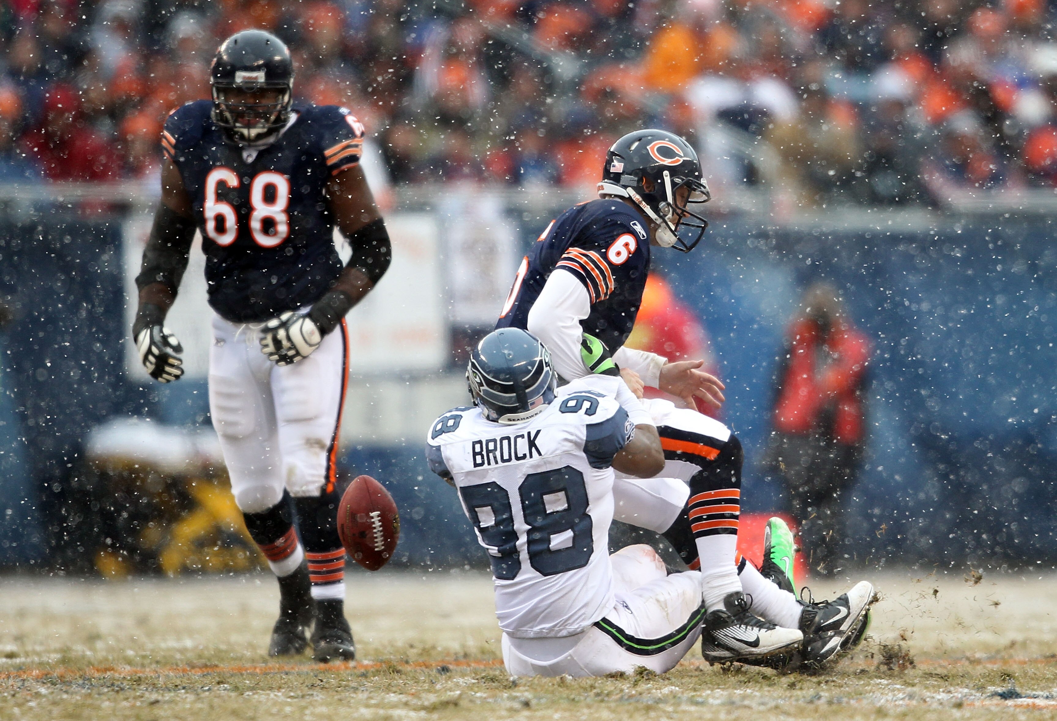 CHICAGO, IL - JANUARY 16:  Raheem Brock #98 of the Seattle Seahawks sacks quarterback Jay Cutler #6 of the Chicago Bears as Cutler fumbles the ball but the Bears recover in the second quarter in the 2011 NFC divisional playoff game at Soldier Field on Jan
