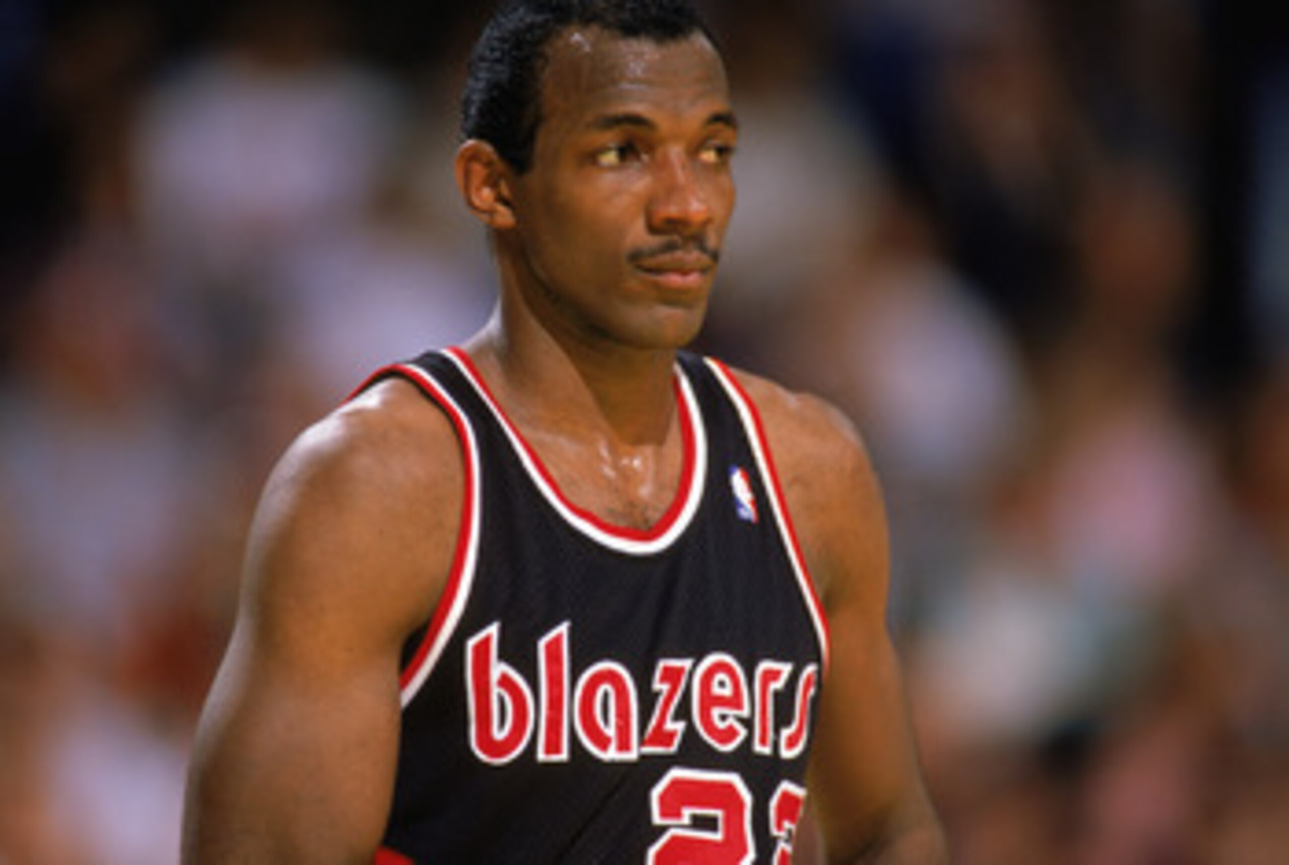 1987: Clyde Drexler #22 of the Portland Trail Blazers watches the 1987-1988 NBA season game. (Photo by Mike Powell/Getty Images) 1987: Clyde Drexler #22 of the Portland Trail Blazers watches the 1987-1988 NBA season game. (Photo by Mike Powell/Getty Images)