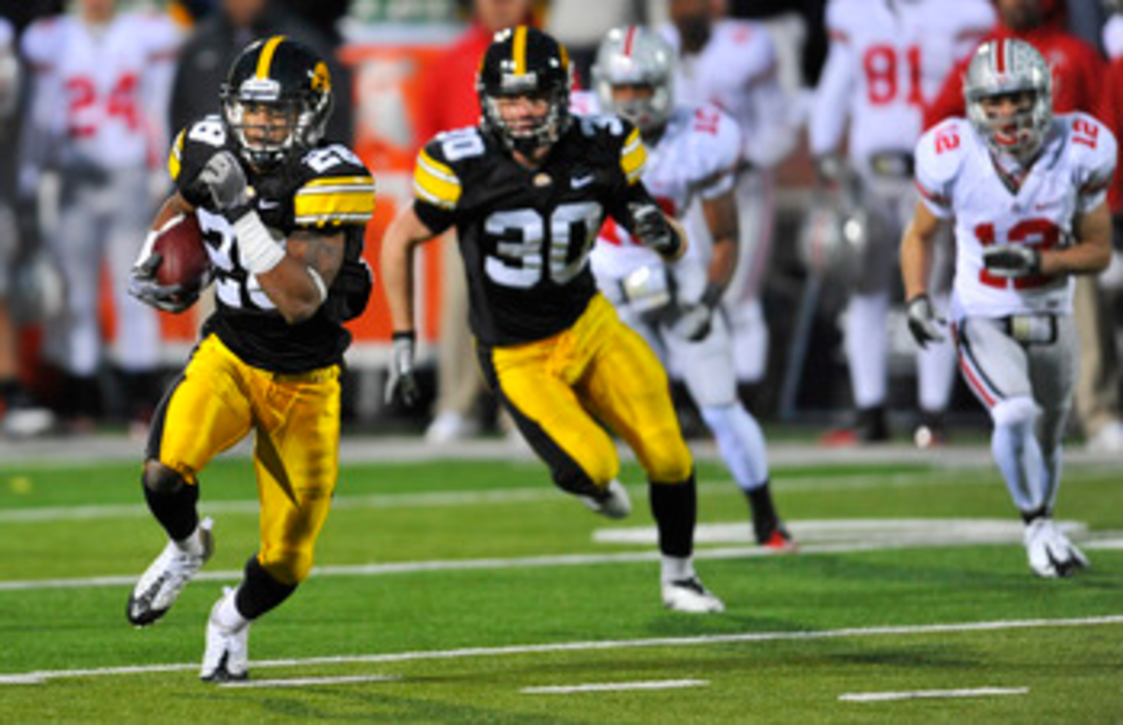 IOWA CITY, IA - NOVEMBER 20: Defensive back Shaun Prater #28 of the University of Iowa Hawkeyes returns a pass interception against the Ohio State Buckeyes during the second half of play at Kinnick Stadium on November 20, 2010 in Iowa City, Iowa. Ohio Sta